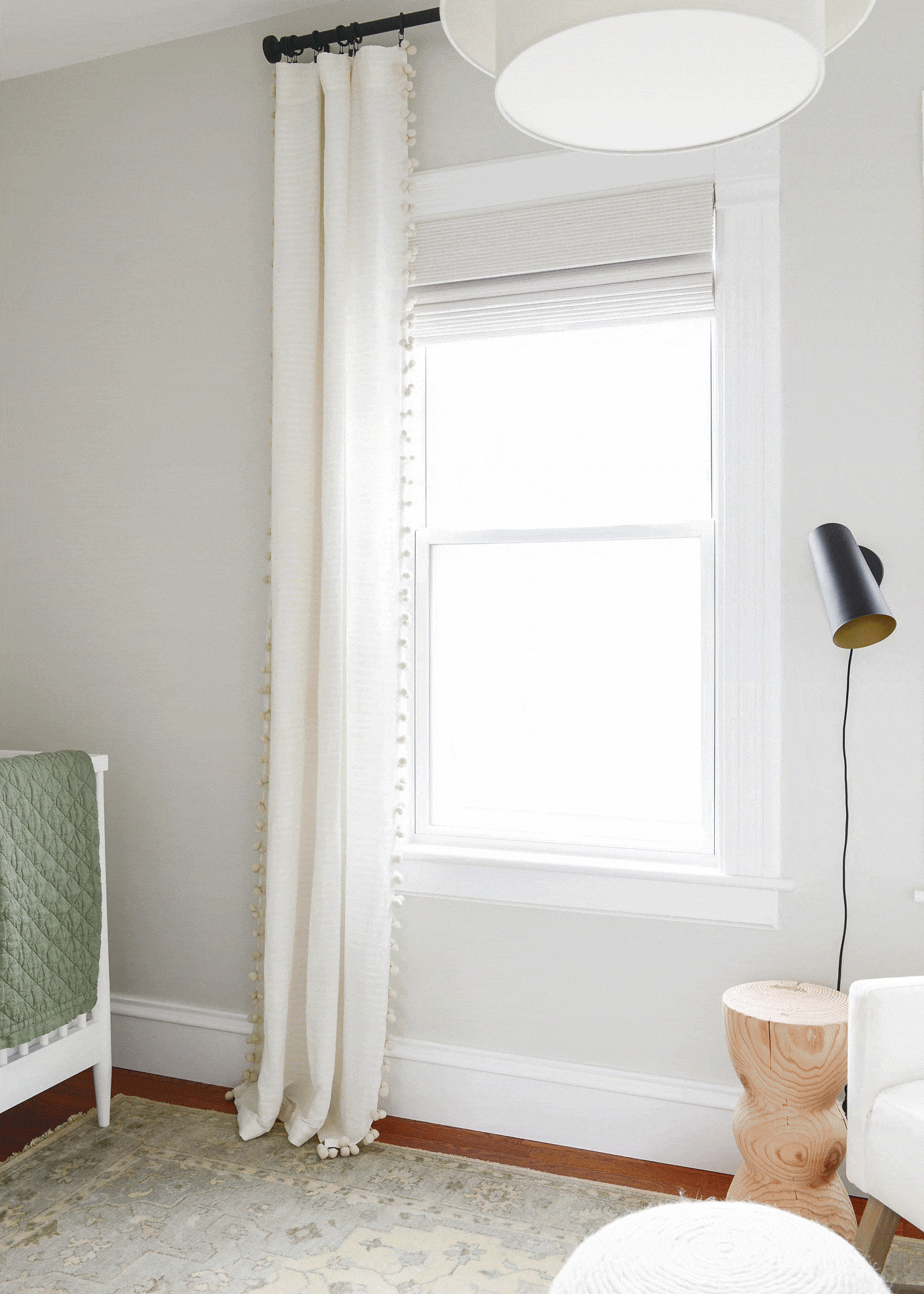 Natural shades in our daughter's nursery, with a blackout liner | via Yellow Brick Home: Which type of window treatment should you use? 