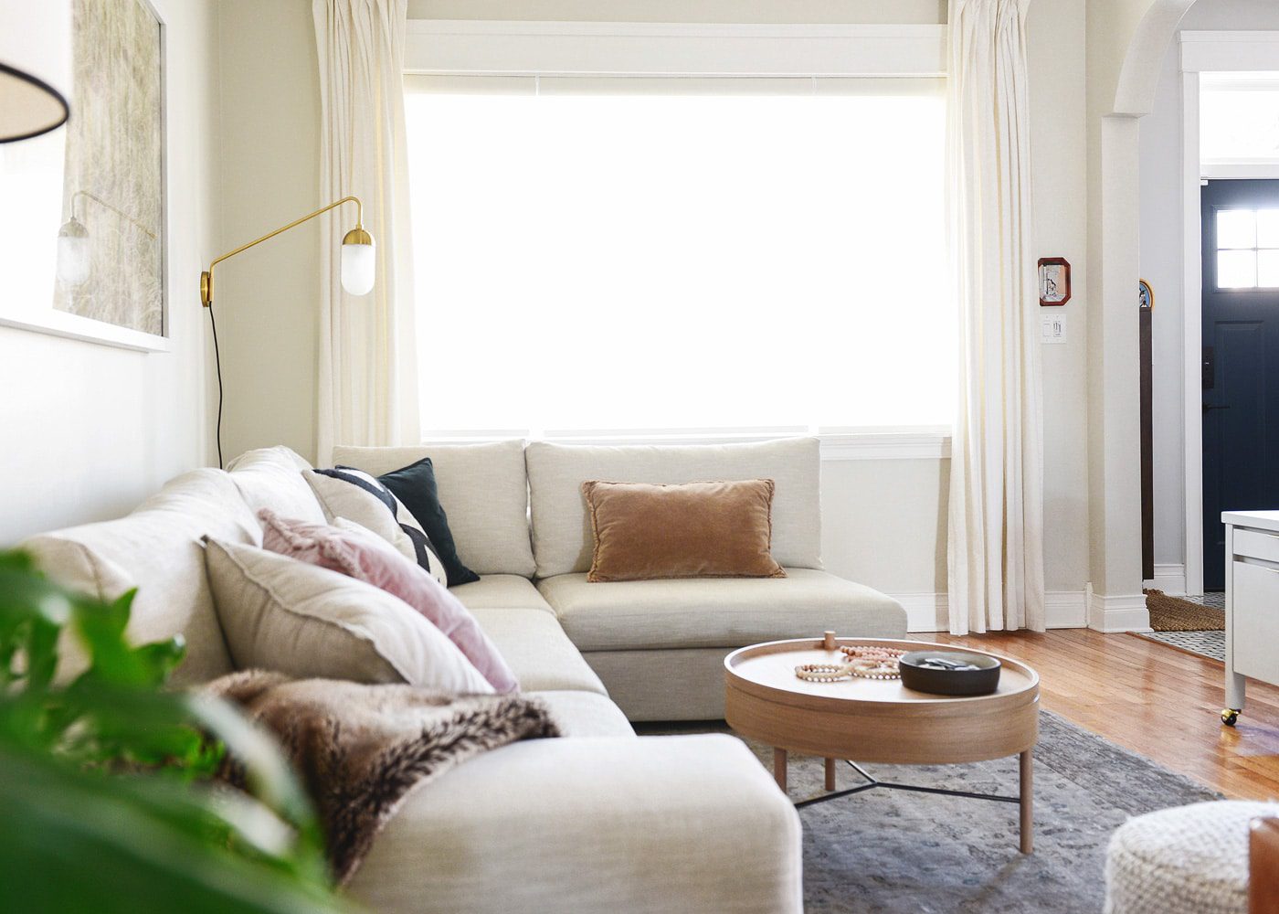 Article Gaba sectional in Pearl White, a living room makeover (or a makeunder?!) // neutral, cozy living room via Yellow Brick Home