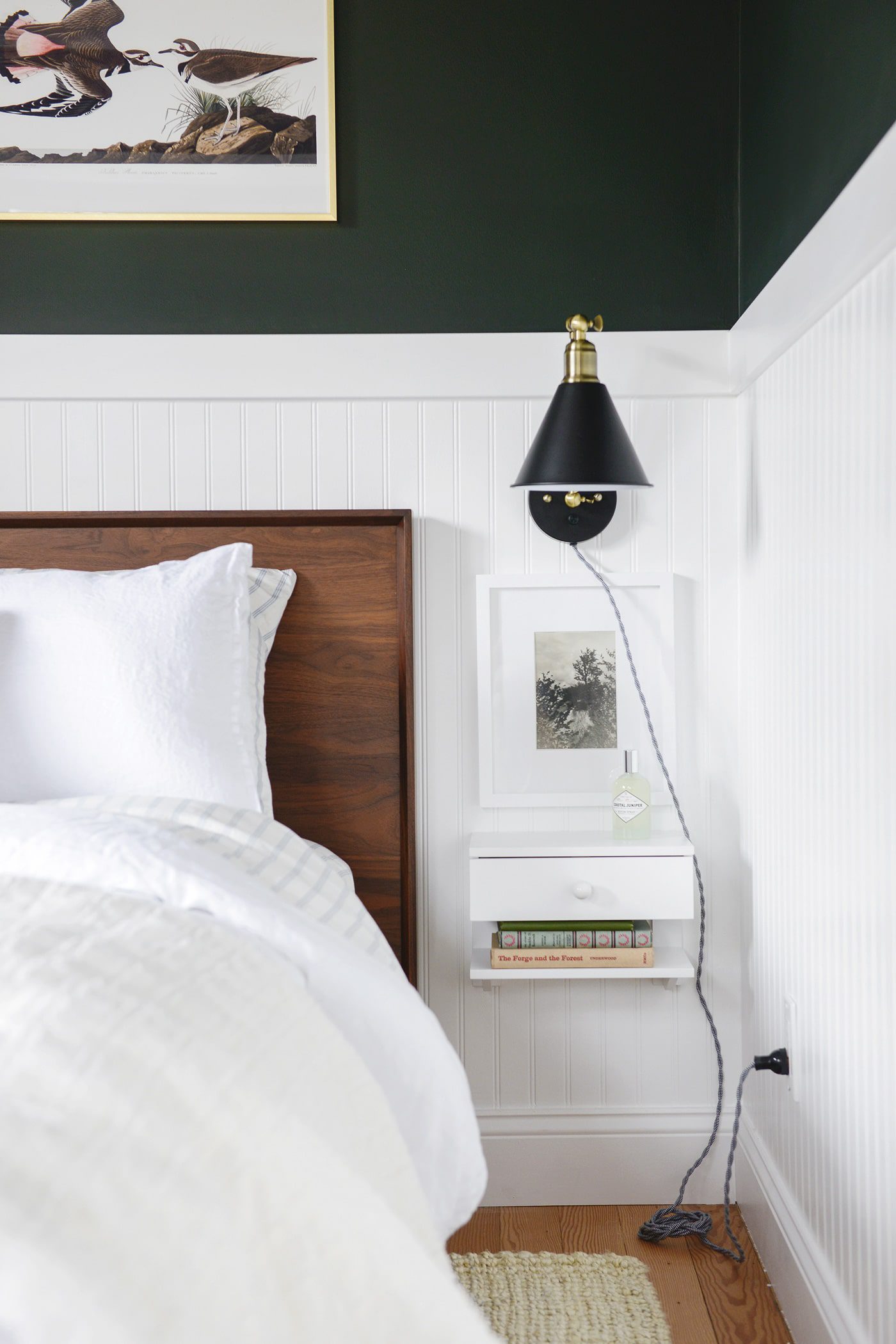 Sherwin-Williams Jasper paint on the walls, walnut bed and white beadboard treatment, via Yellow Brick Home