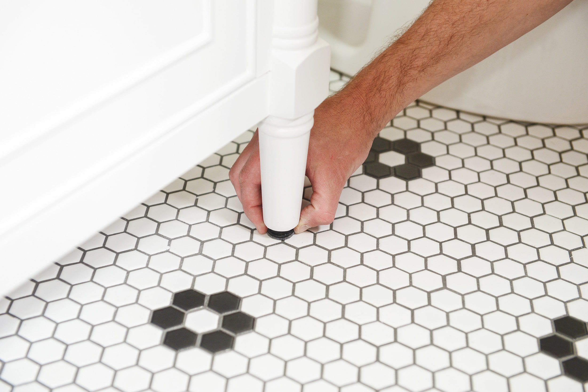 Simple 5 step bathroom vanity installation | how to install a bathroom vanity and faucet | via Yellow Brick Home