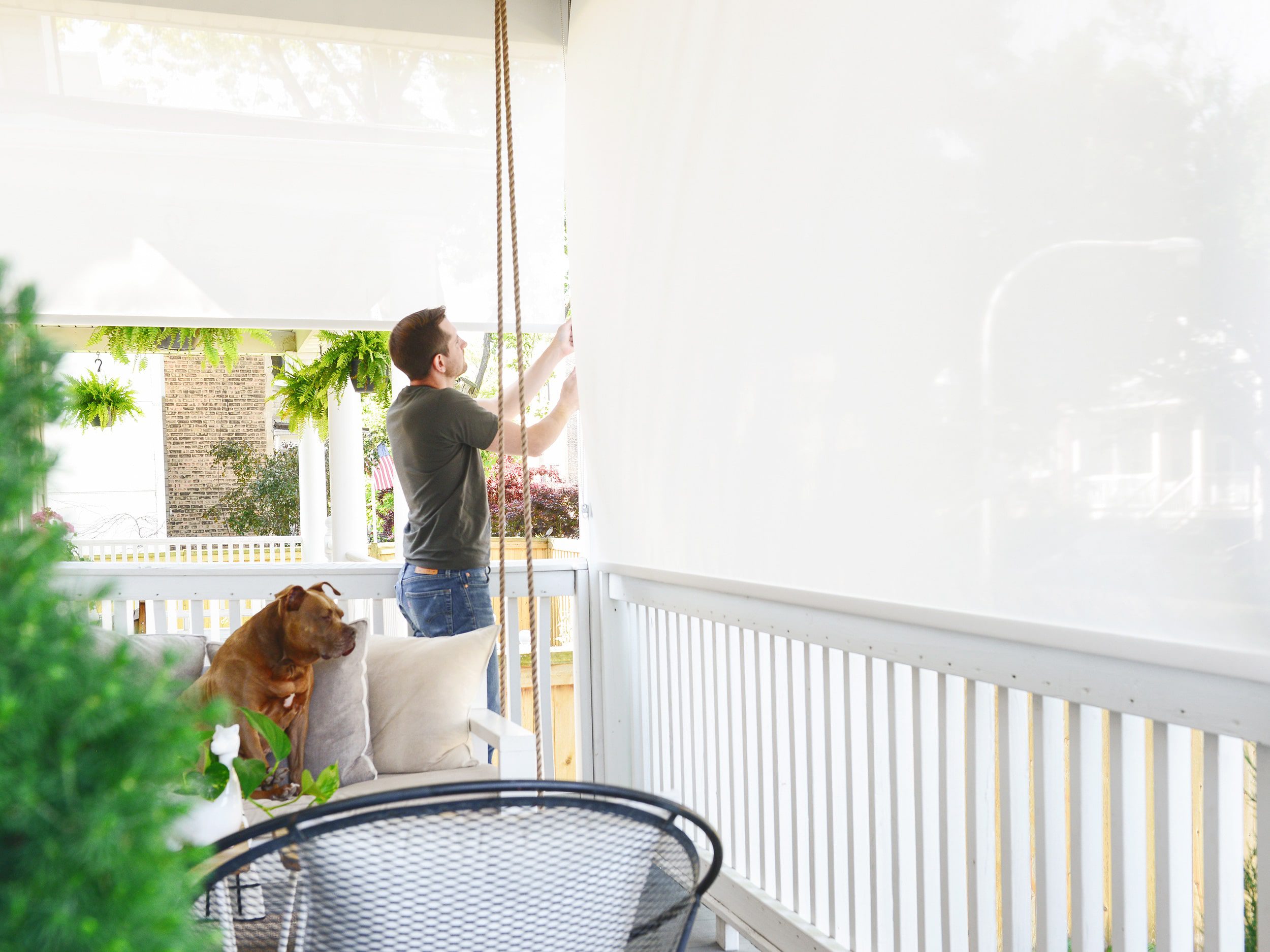How we installed solar shades on our urban front porch. Via Yellow Brick Home