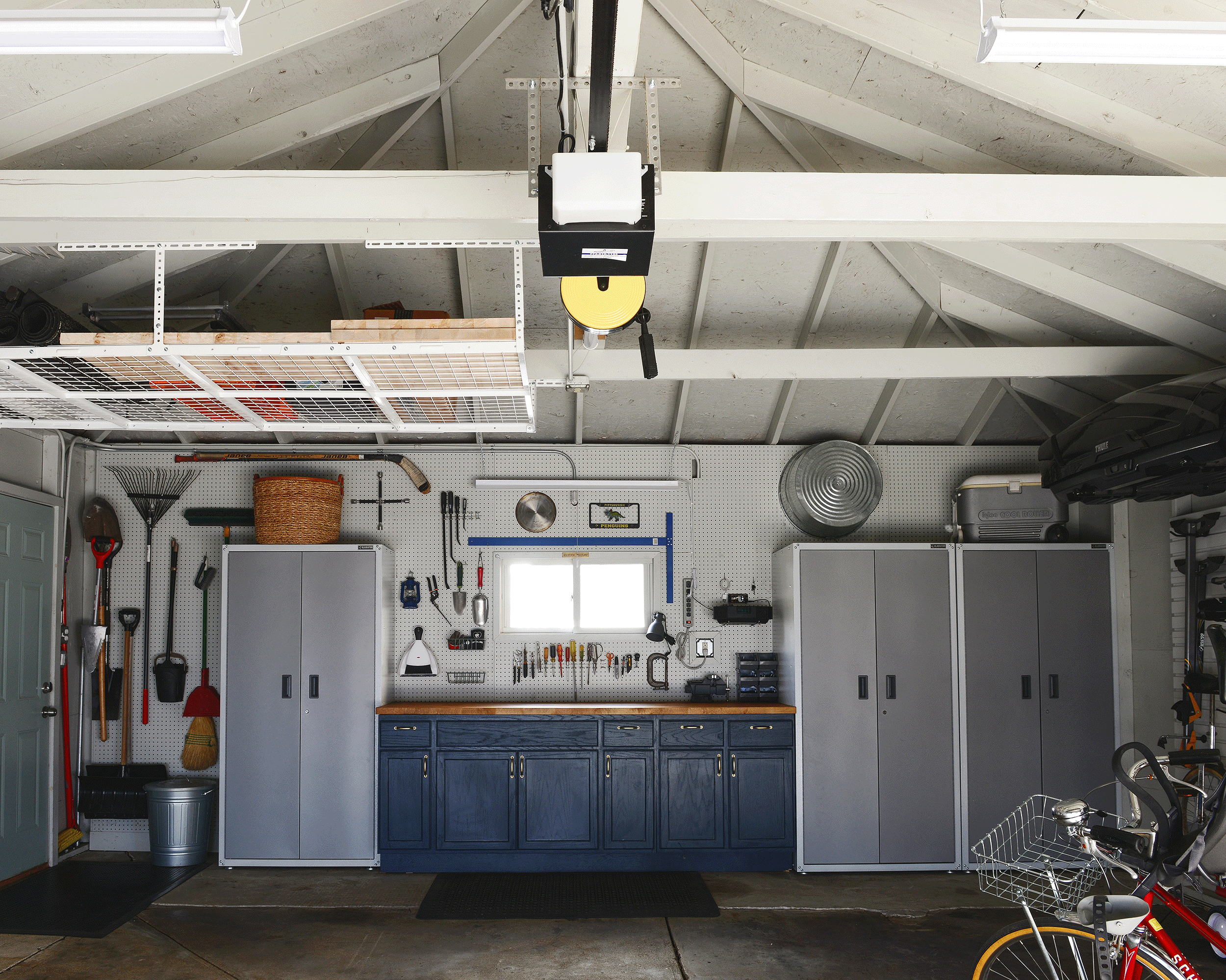 A .gif of all the garage lights turning on, one by one // 7 Garage Organization Tips Before Winter Hits! via Yellow Brick Home with Lowe's Home Improvement #lowespartner