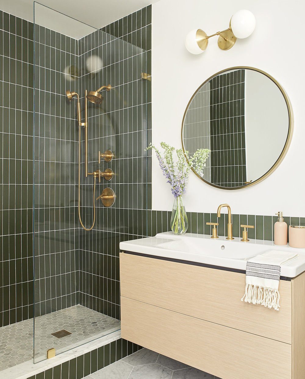 Bathroom with green tile and a light oak sink cabinet | Inspiration for Stacked Tile, stacked bond tile pattern, via Yellow Brick Home