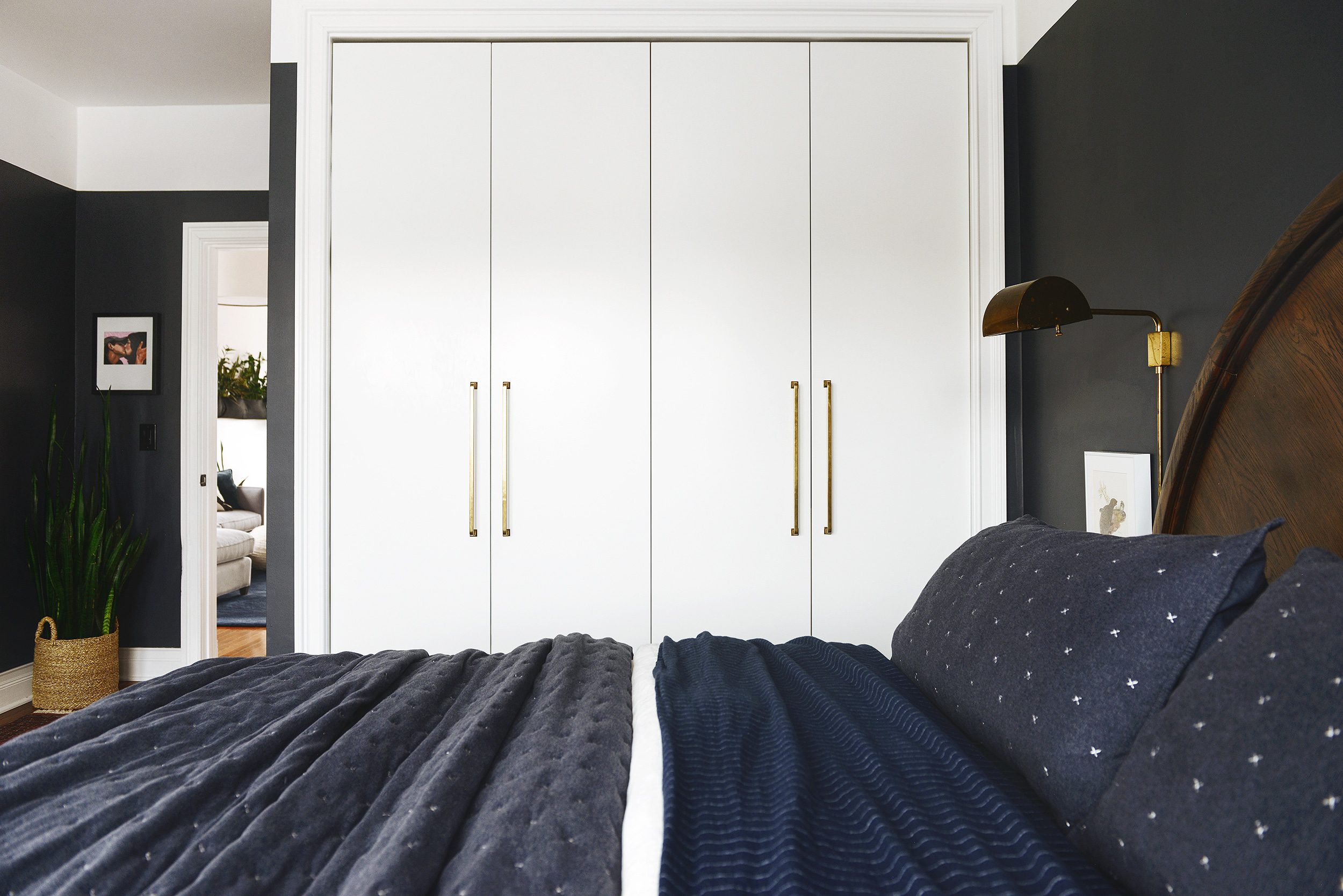 Floor to ceiling wardrobes built in using the IKEA PAX system | via Yellow Brick Home