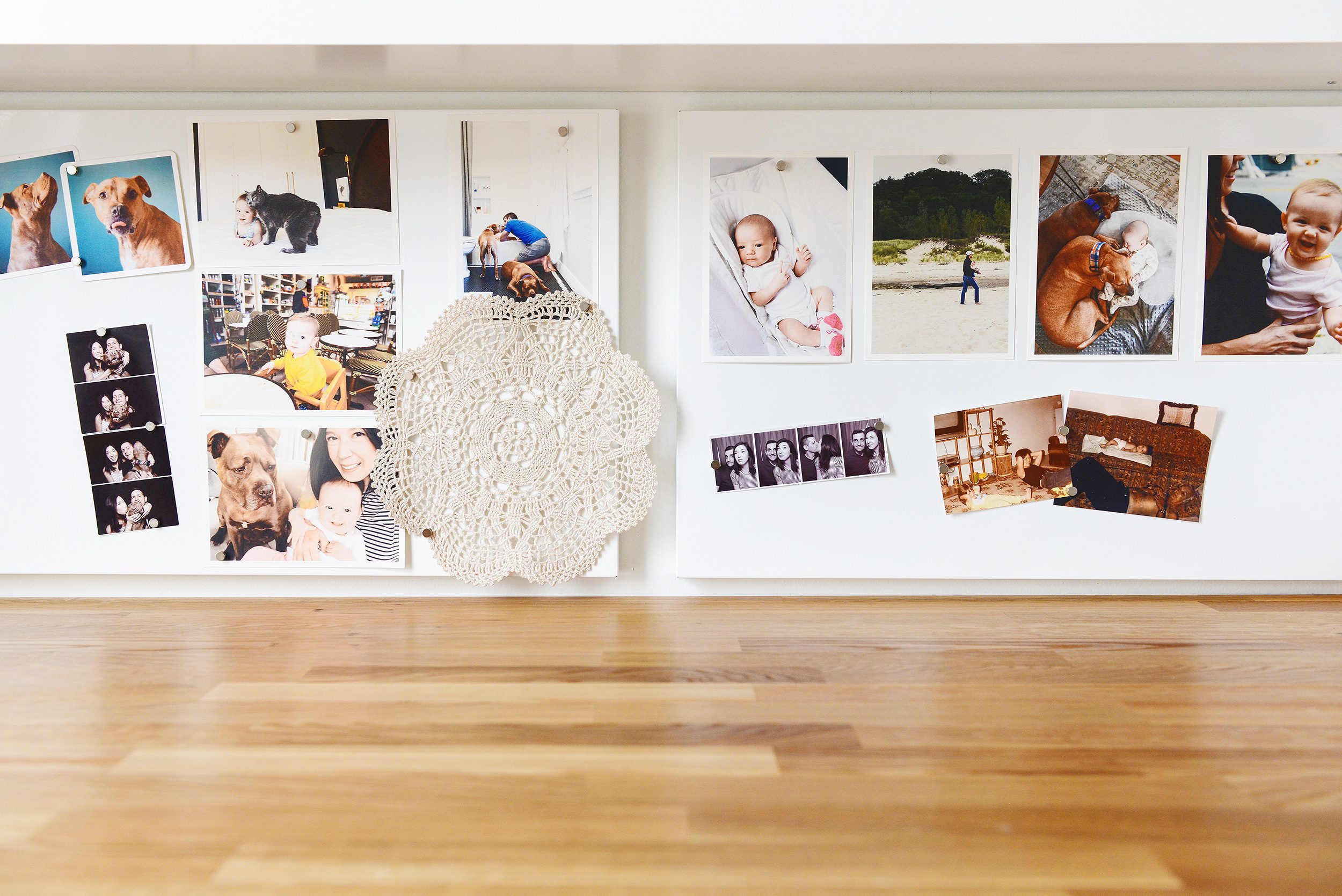 Magnet boards filled with family photos, photo strips and inspiration | via Yellow Brick Home