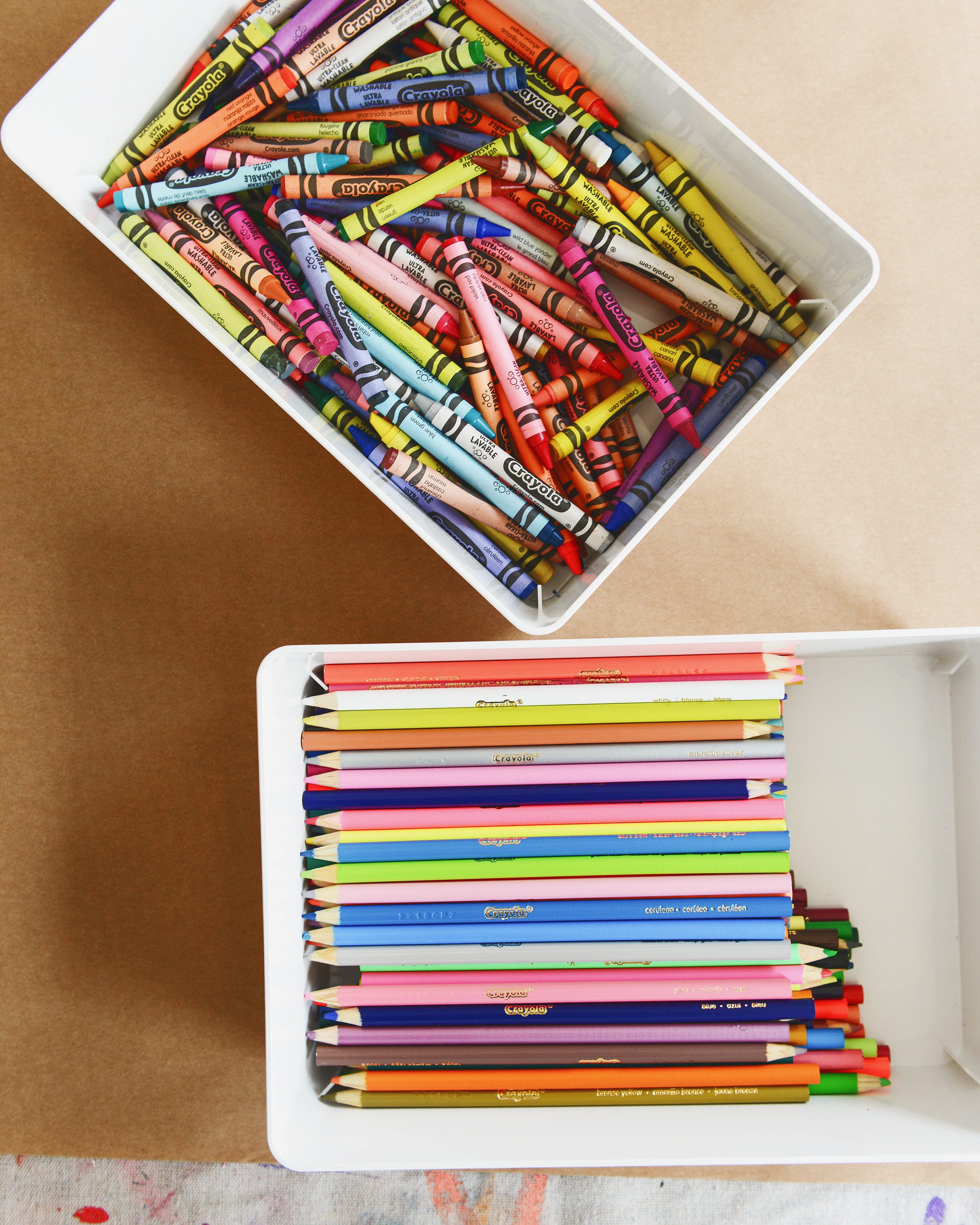 Crayons and colored pencils in art bins | How to have a successful family art party! via Yellow Brick Home