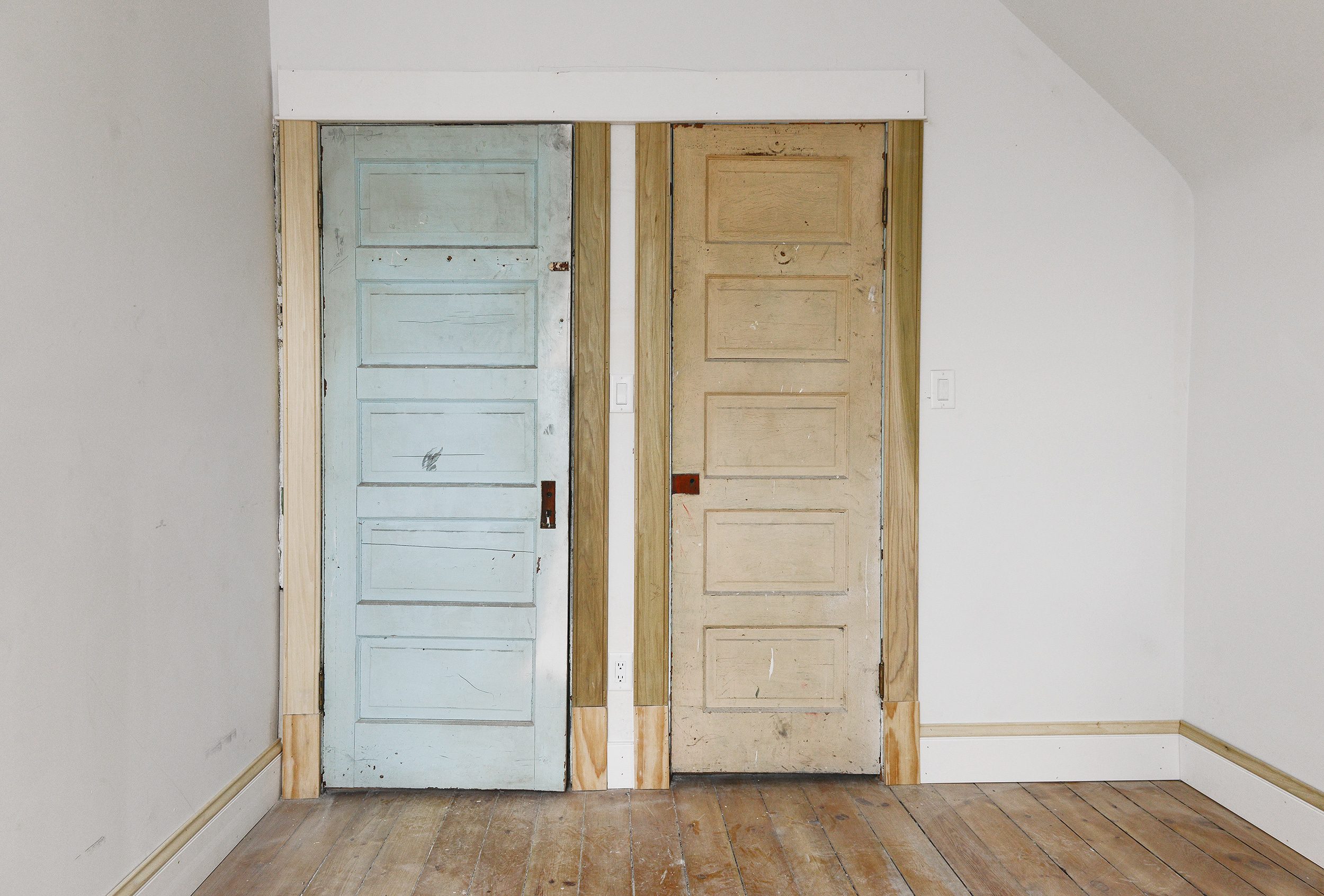 A vintage bedroom with 5 panel doors and new door casings // via Yellow Brick Home