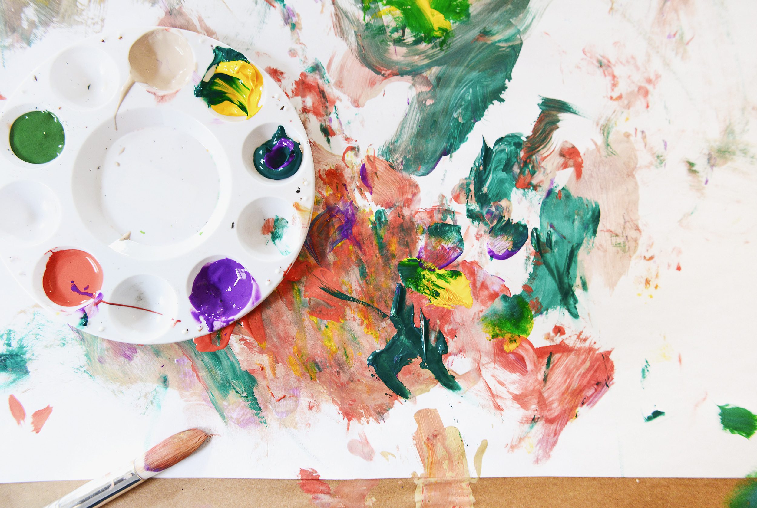 A flat lay view of Lucy's painting | How to have a successful family art party! via Yellow Brick Home