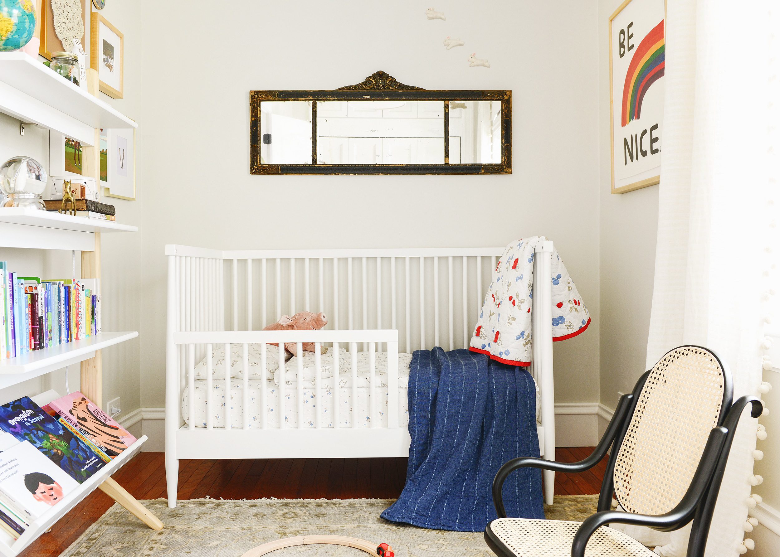 Neutral nursery with pops of color using IKEA bedding | via Yellow Brick Home