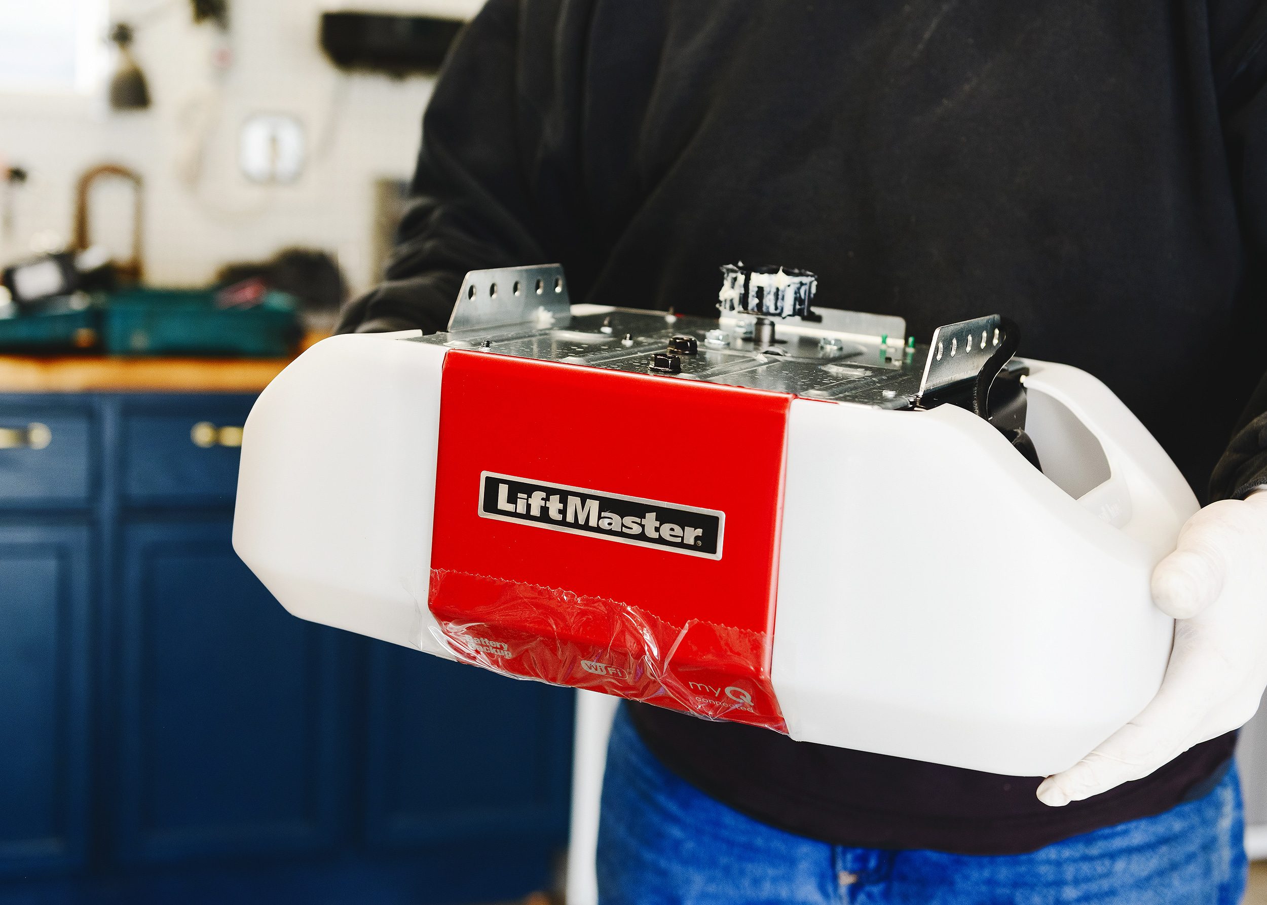 A brand new Liftmaster Secure View garage door opener is ready to be installed // via yellow brick home 