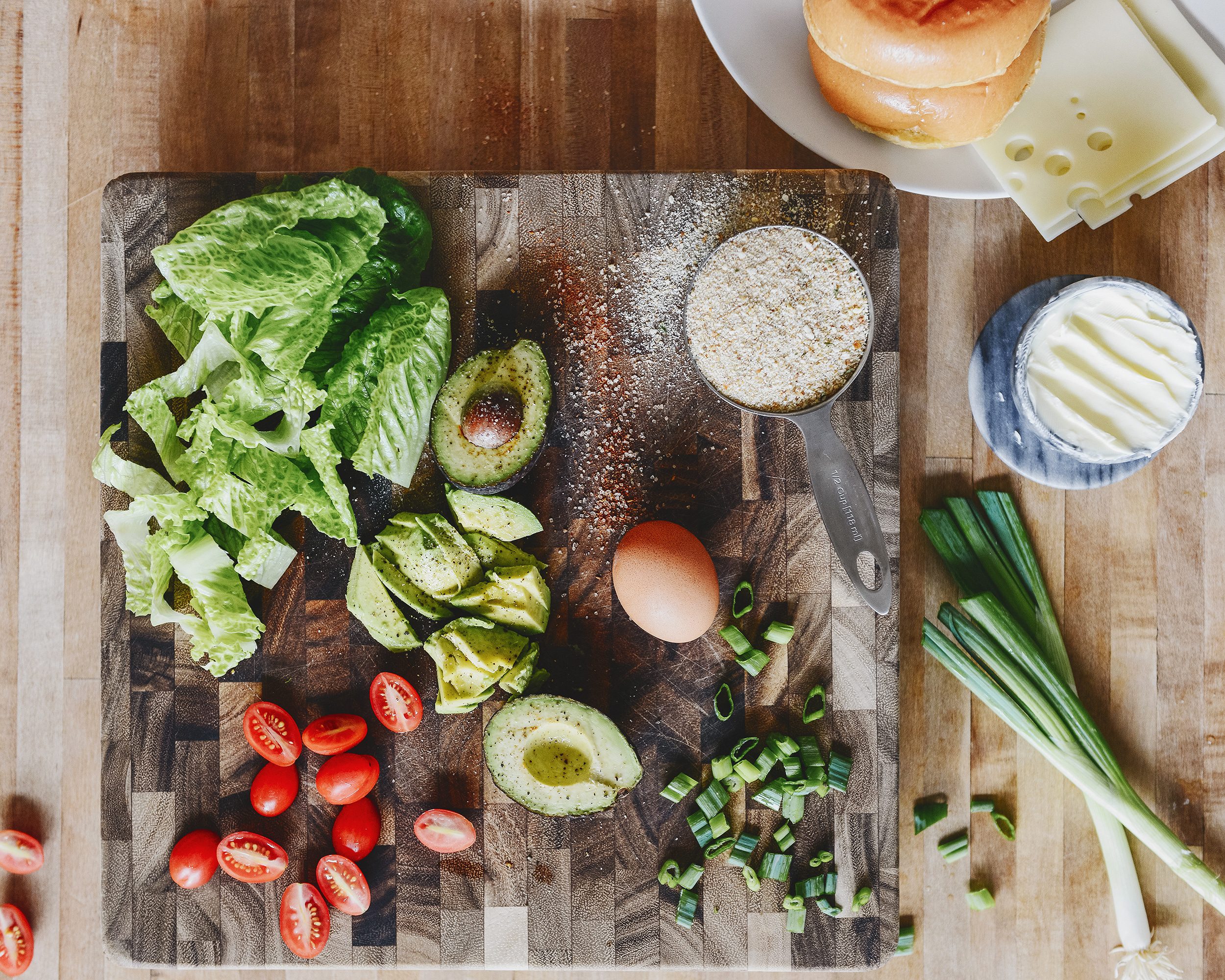 Turkey burger ingredients are laid out on a butcher block countertop // via yellow brick home