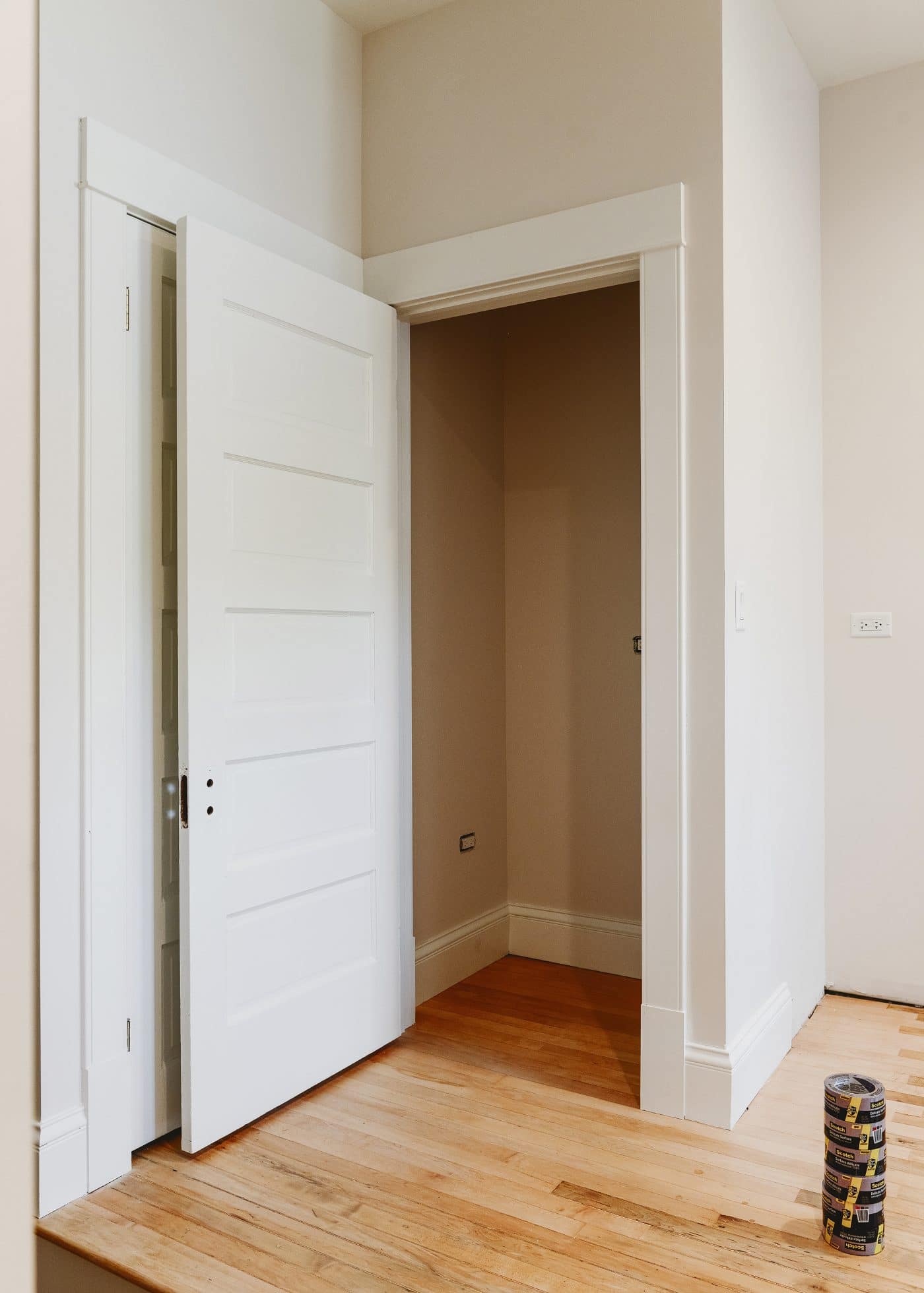 A view of the pantry closet before the painting project begins | via Yellow Brick Home