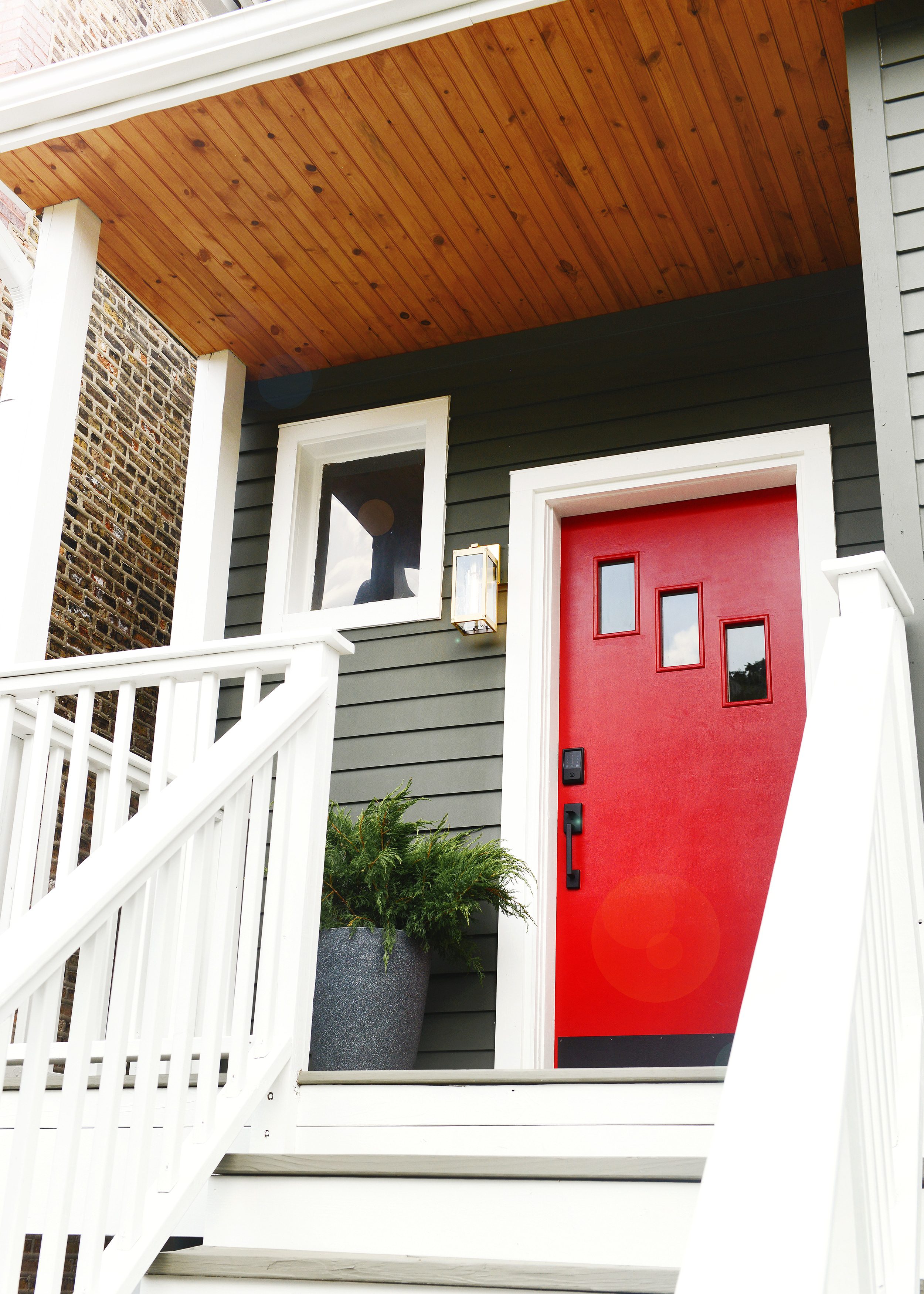 Schlage Encode smart lock on a bright red front door | via Yellow Brick Home