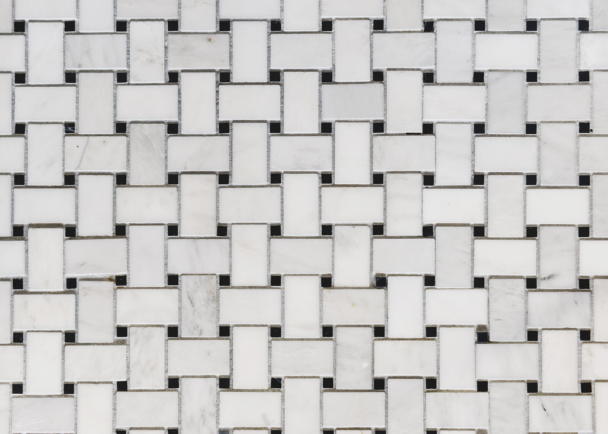 detail of marble basketweave tile | via Yellow Brick Home