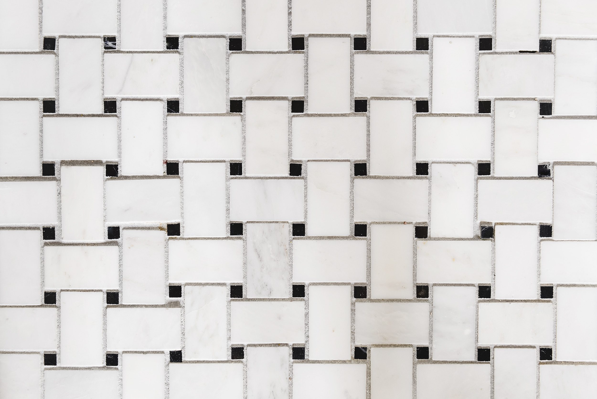A close up of marble mosaic floor tile | via Yellow Brick Home