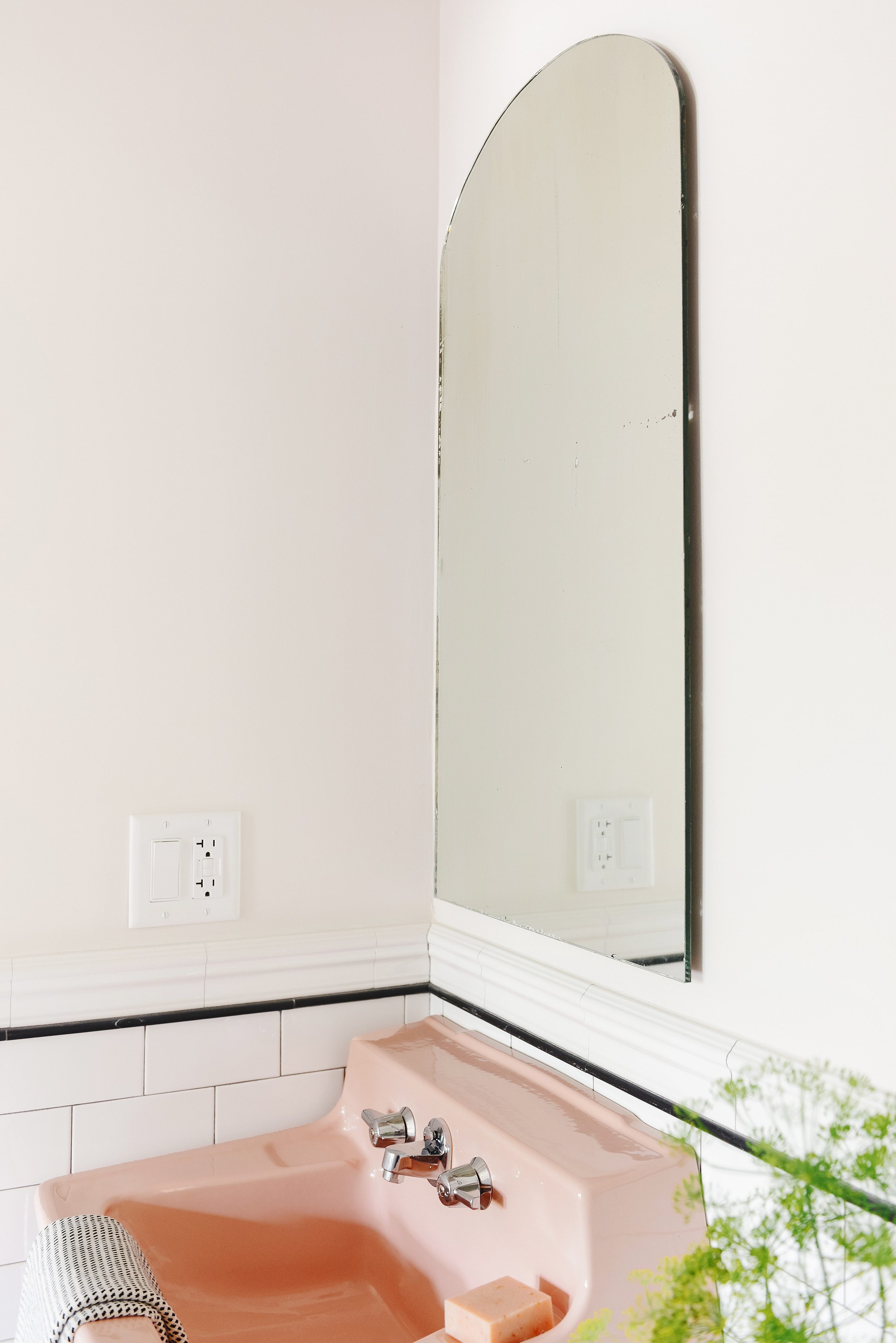 The vintage mirror floats away from the wall | via Yellow Brick Home