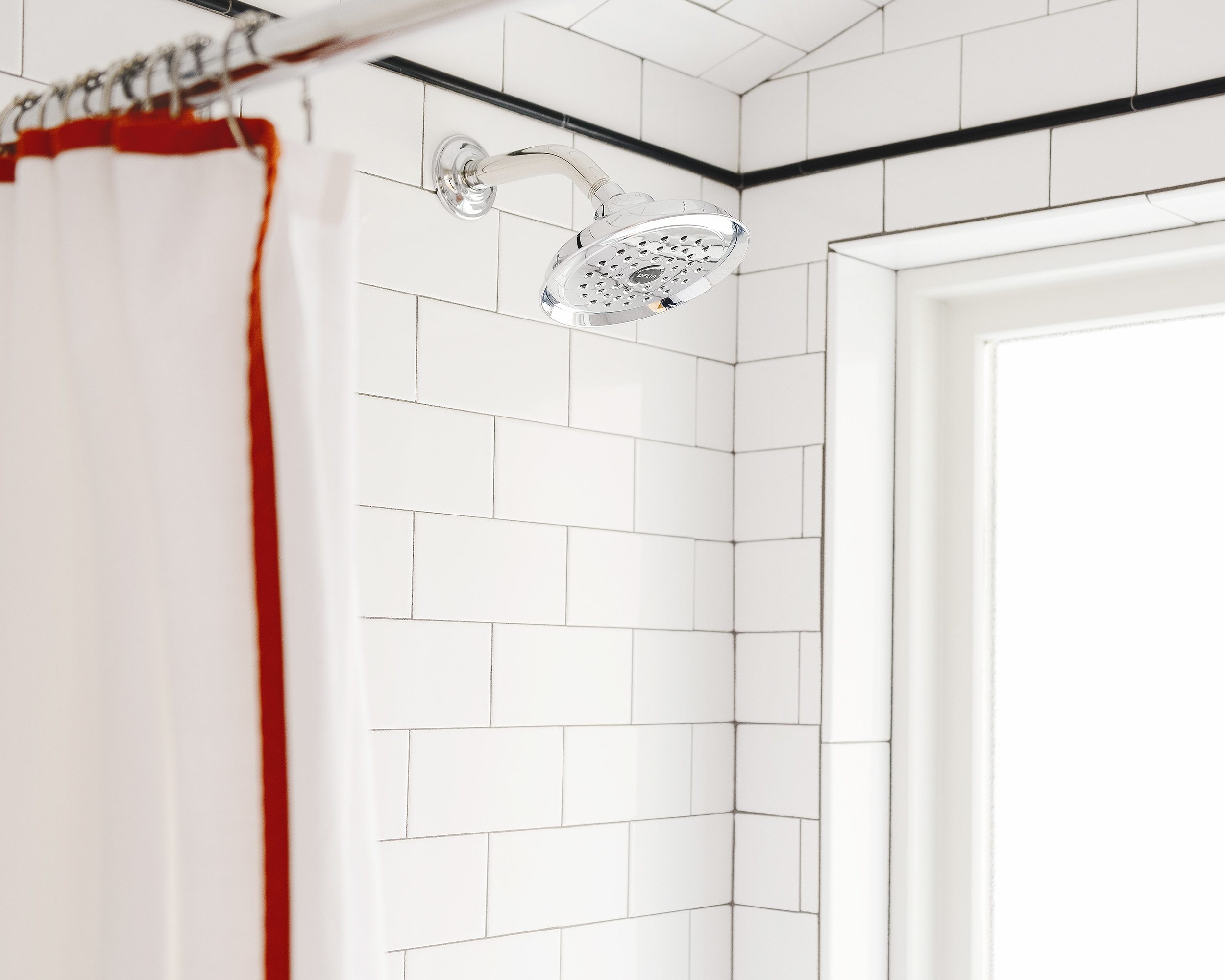 Delta shower fixtures in polished chrome | via Yellow Brick Home