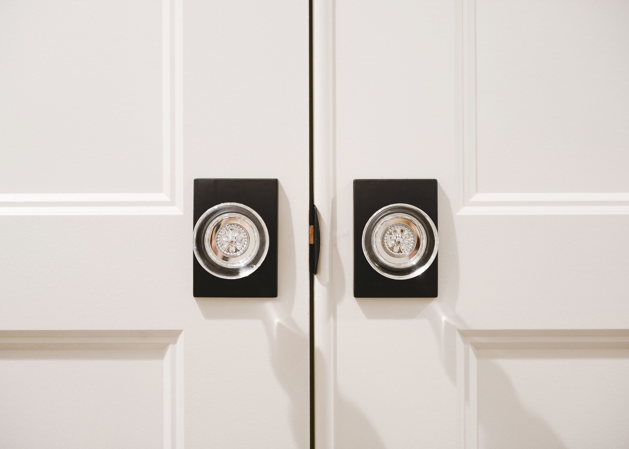 Schlage custom hobson glass knob detail, pair of knobs side-by-side | via Yellow Brick Home