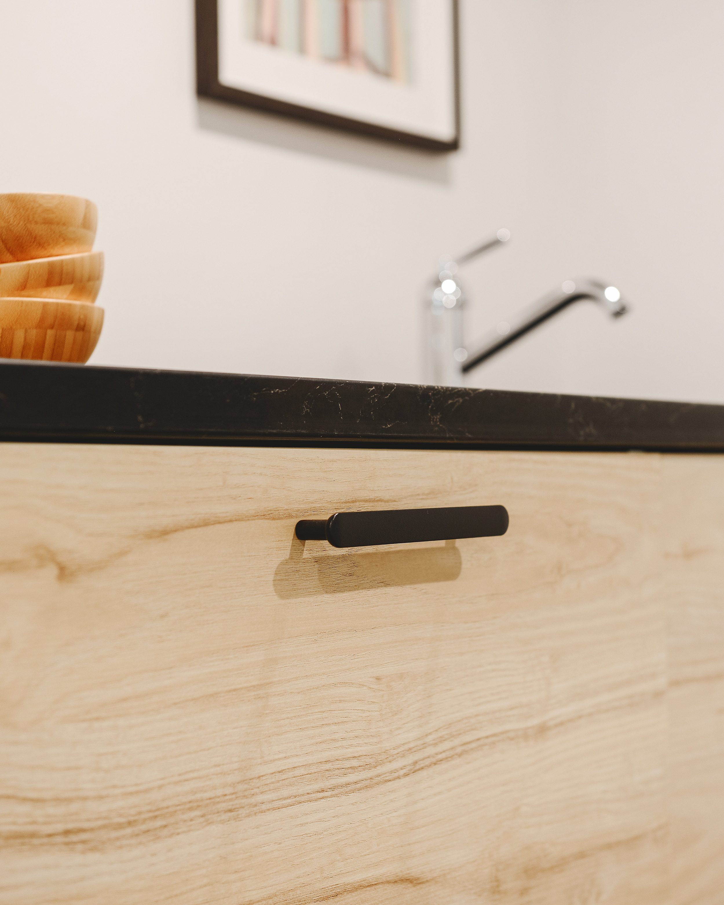 A close-up of the IKEA NYDALA handles on our cabinetry | via Yellow Brick Home
