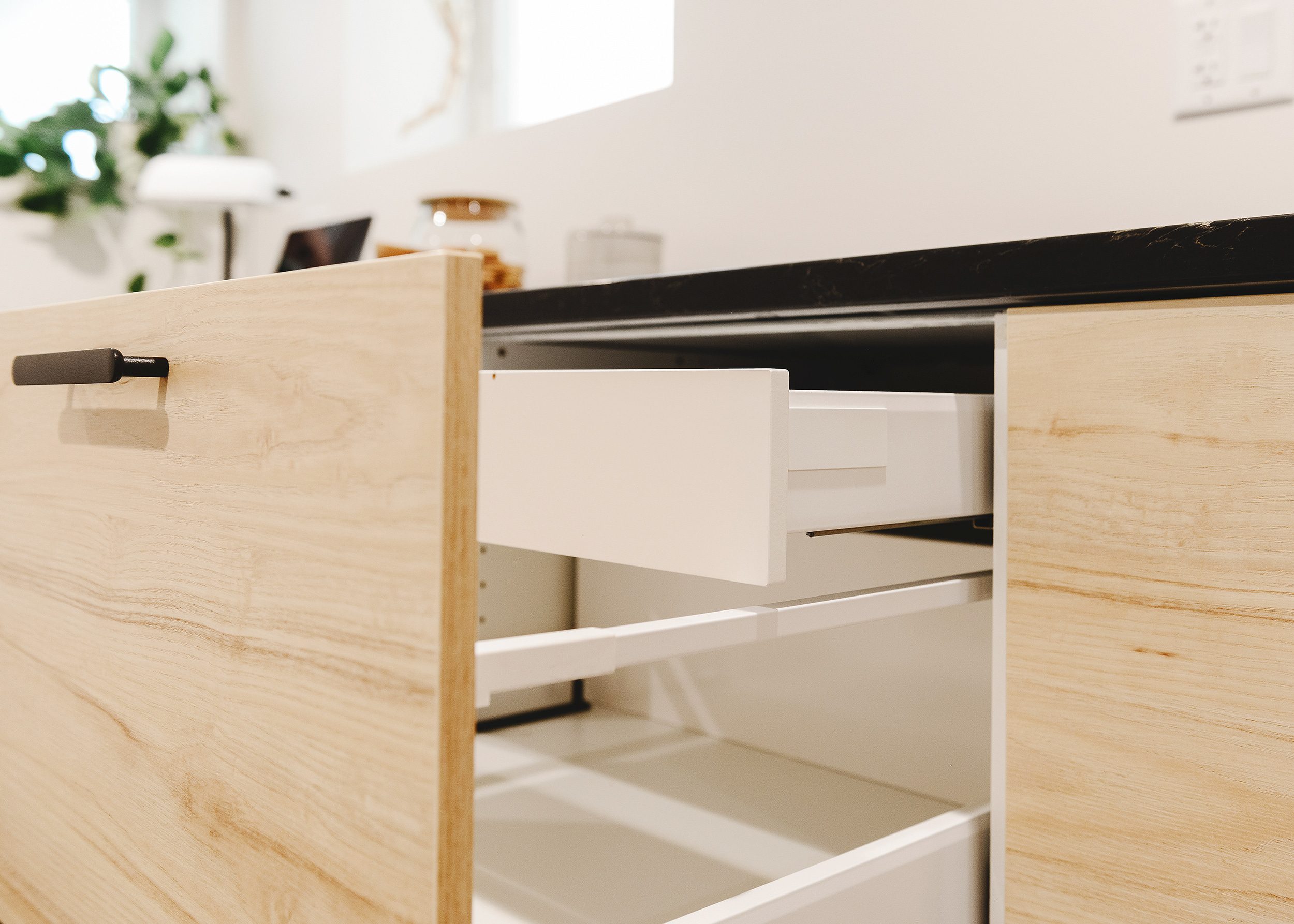A close-up of the IKEA cabinetry with pull-out drawers | via Yellow Brick Home