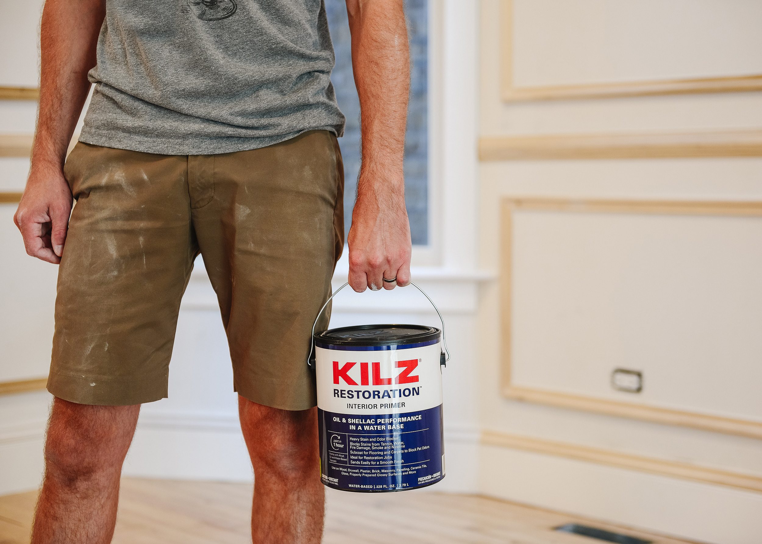 Kilz Restoration primer for the DIY panel molding in the dining room | via Yellow Brick Home