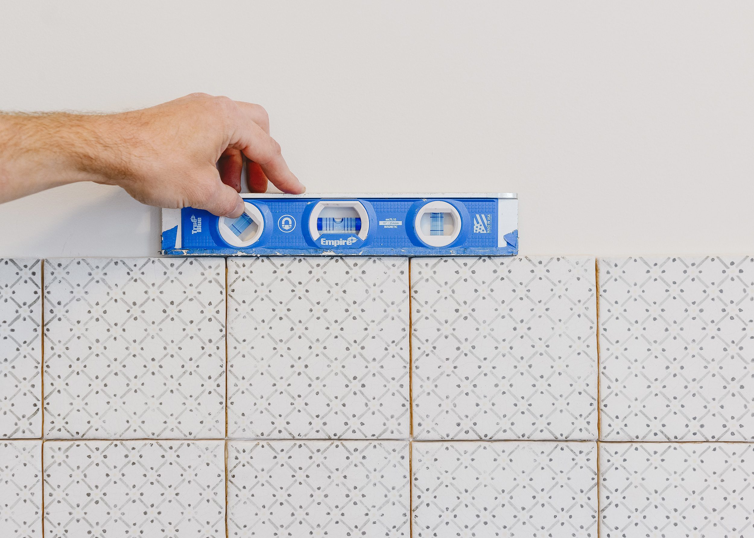 Always level during tile installation! via Yellow Brick Home x @thetileshop #ad