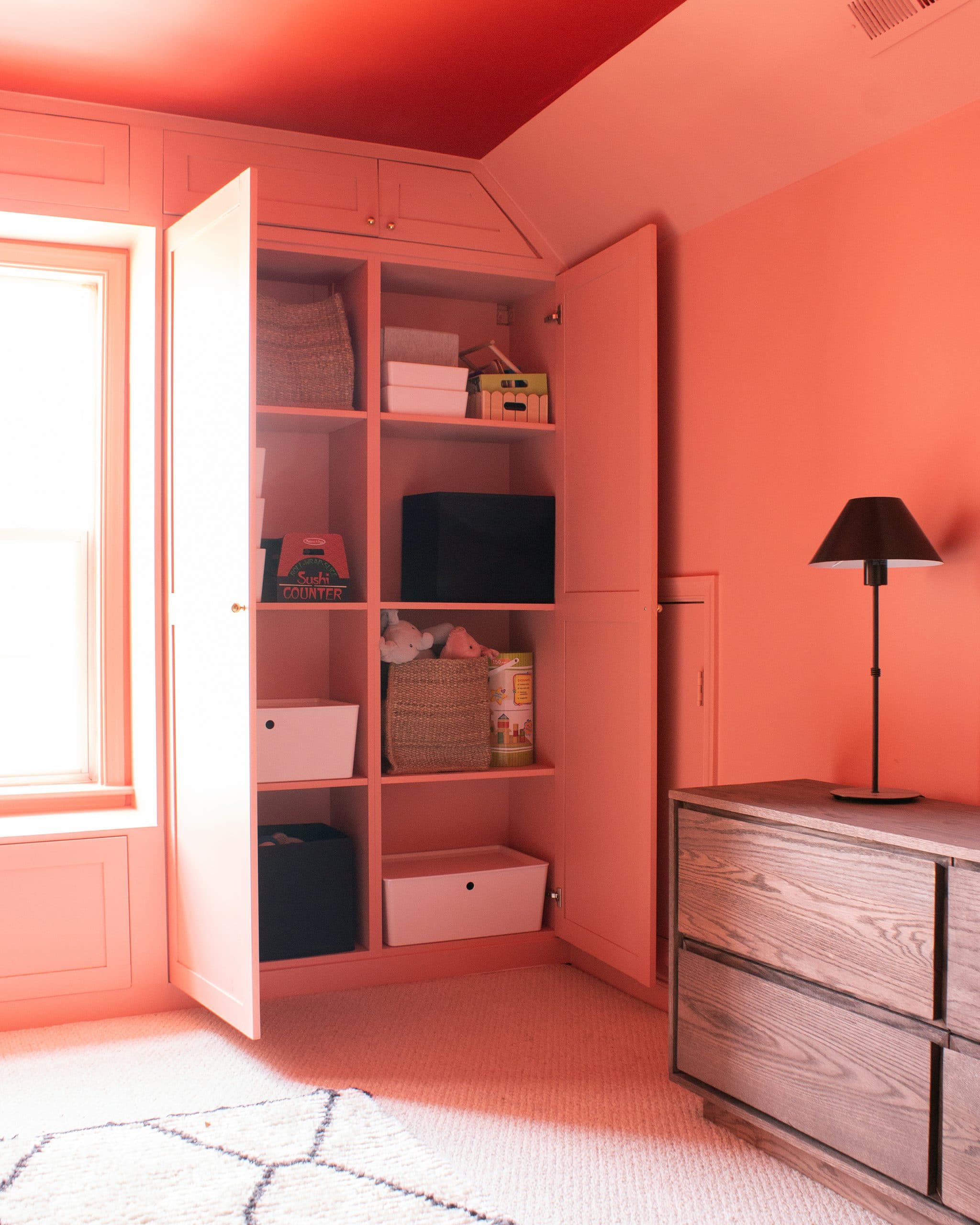 A happy pink play room by Cass Makes Home | featured on Yellow Brick Home
