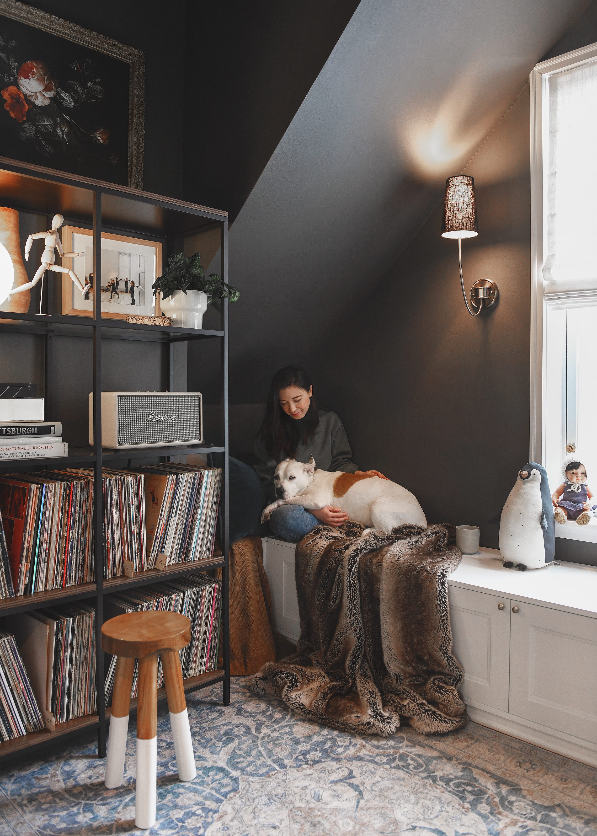 Kim and Catfish in the snug, bundled up with their favorite things | via Yellow Brick Home