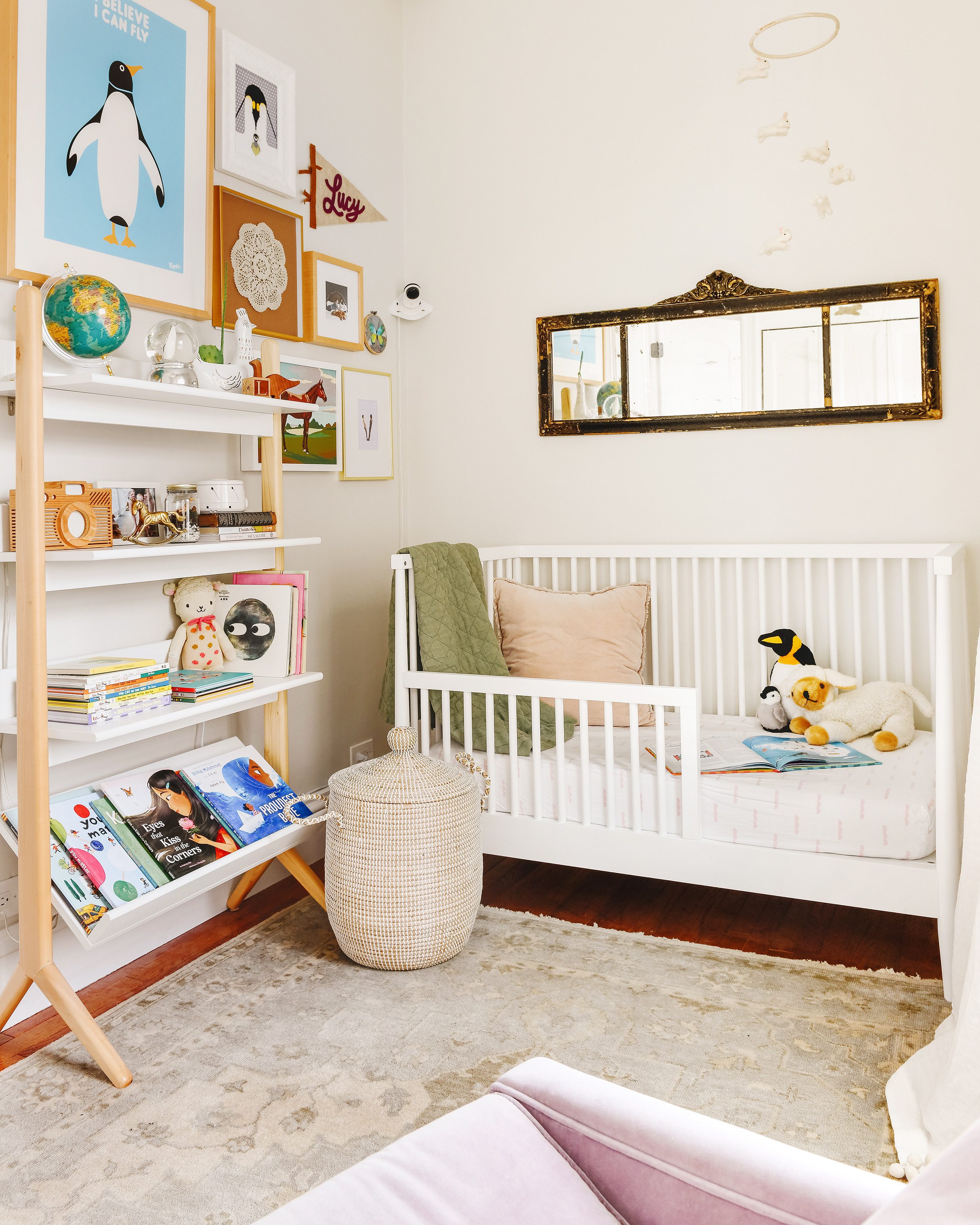 Lucy's nursery and bookshelf! Lucy's diverse library | 23 diverse + inclusive books for kids | via Yellow Brick Home