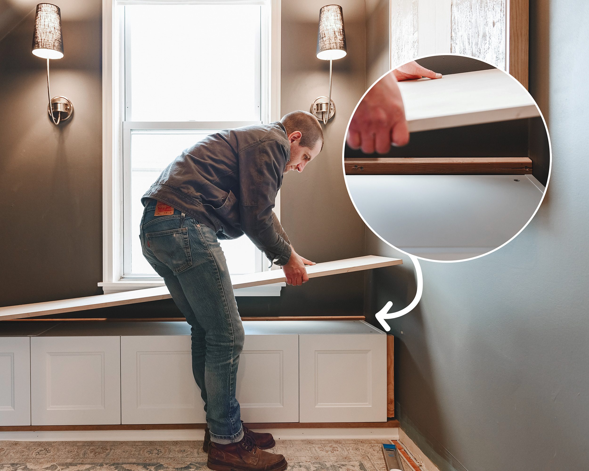 Scott lowers the cabinet top into place // via Yellow Brick Home