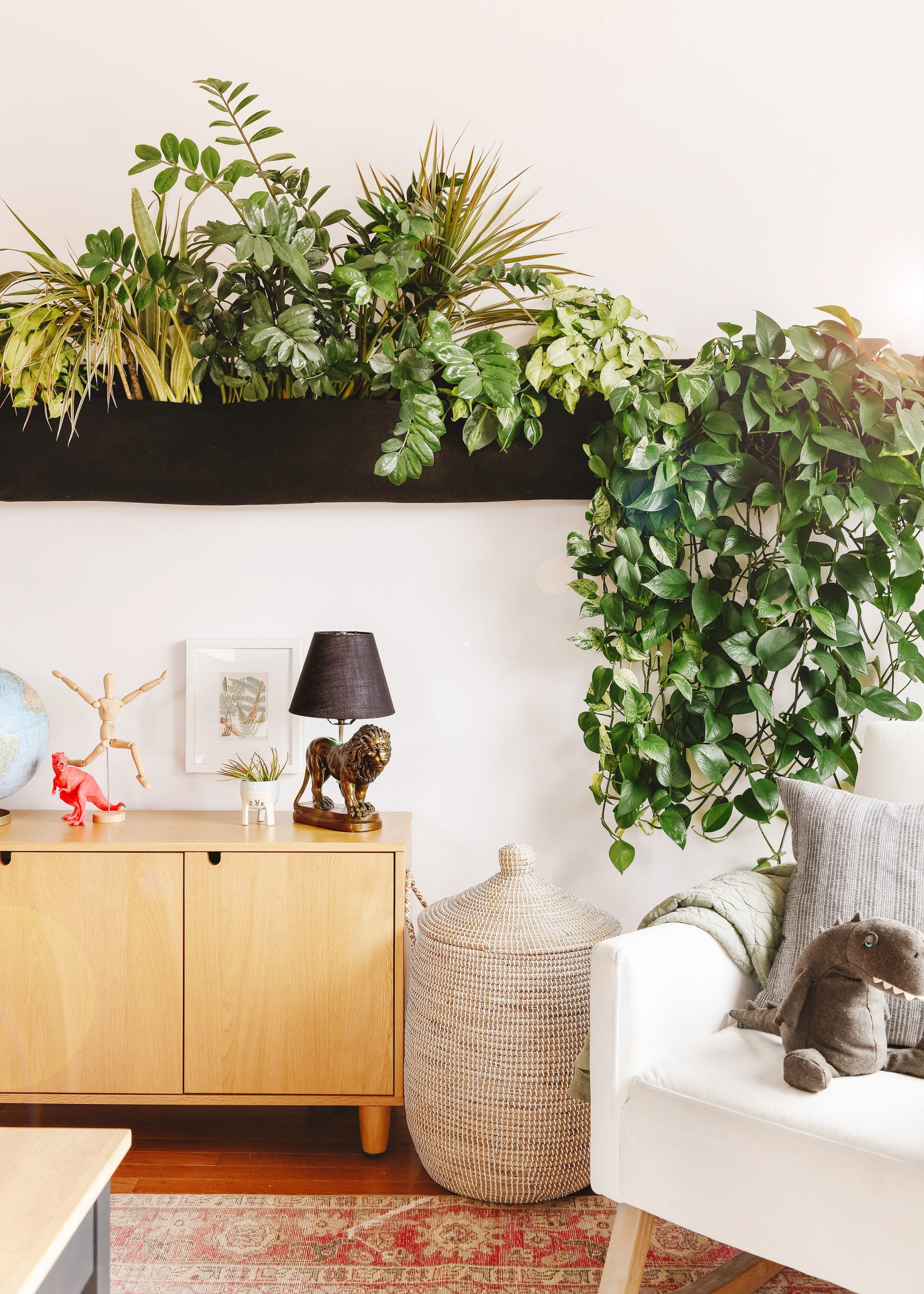living wall planter in Lucy's playroom | How We Care for Houseplants via Yellow Brick Home #houseplants