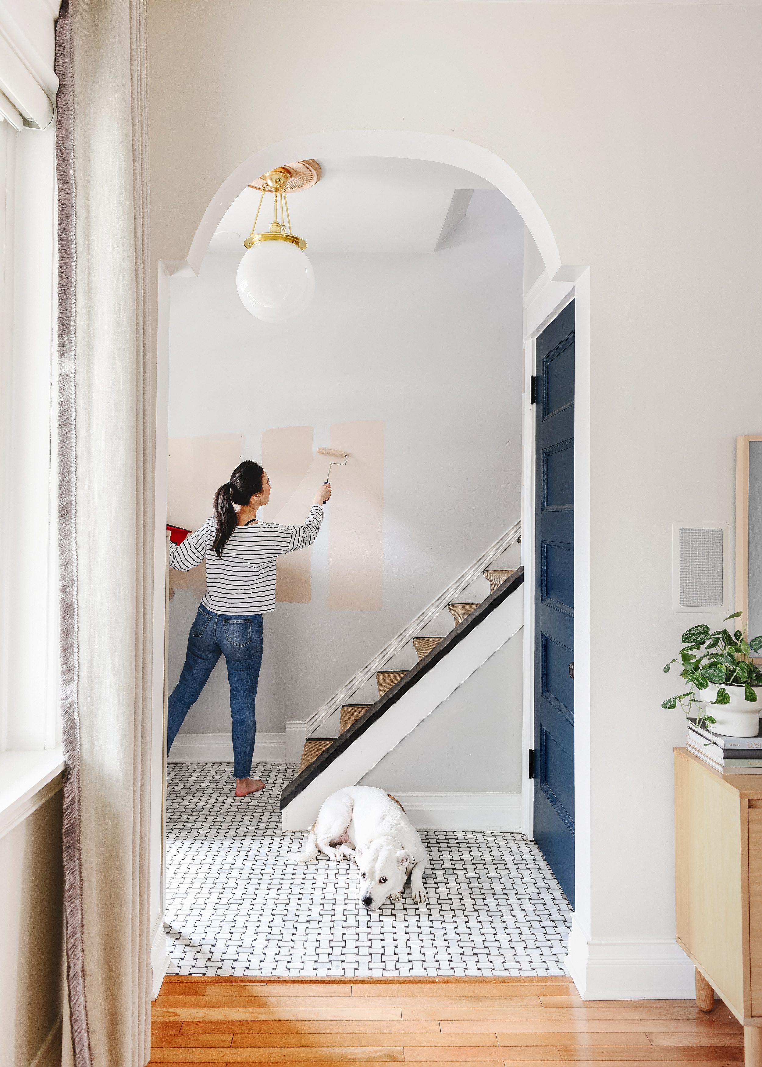 Painting our entryway PEACH! via Yellow Brick Home