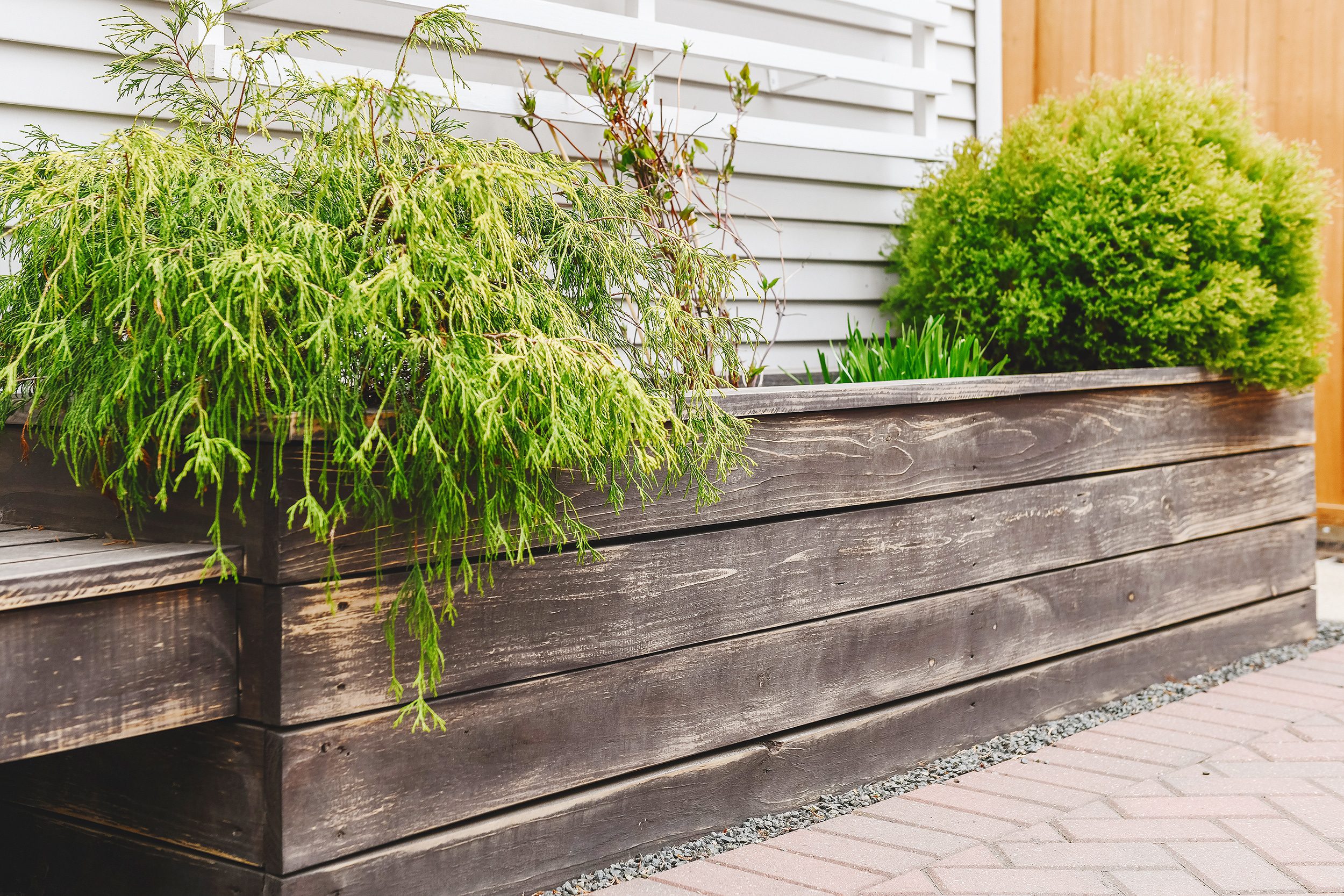 The sanded planter boxes ready for the new black stain // via Yellow Brick Home