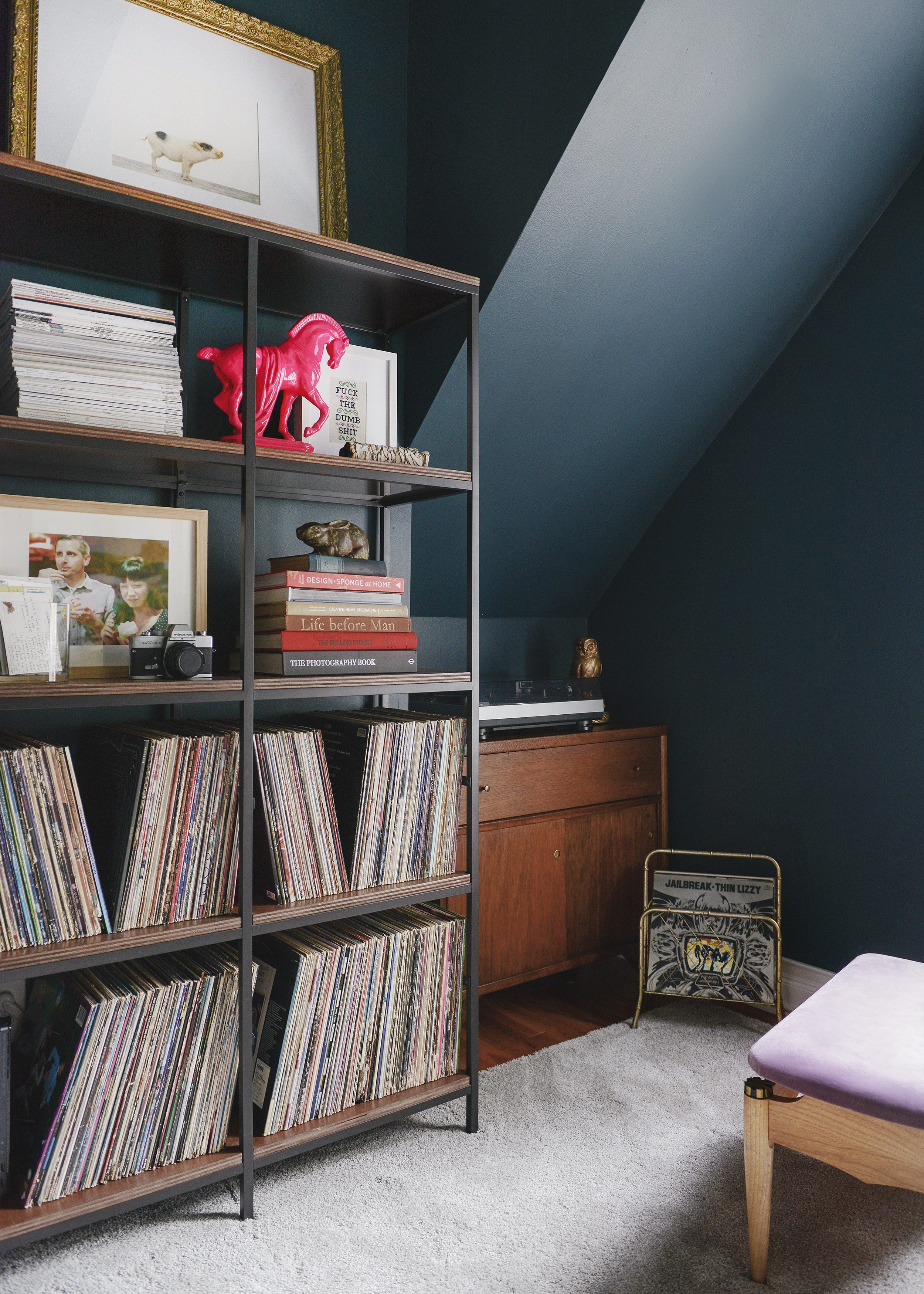 Deep navy / teal nook with record storage | via Yellow Brick Home