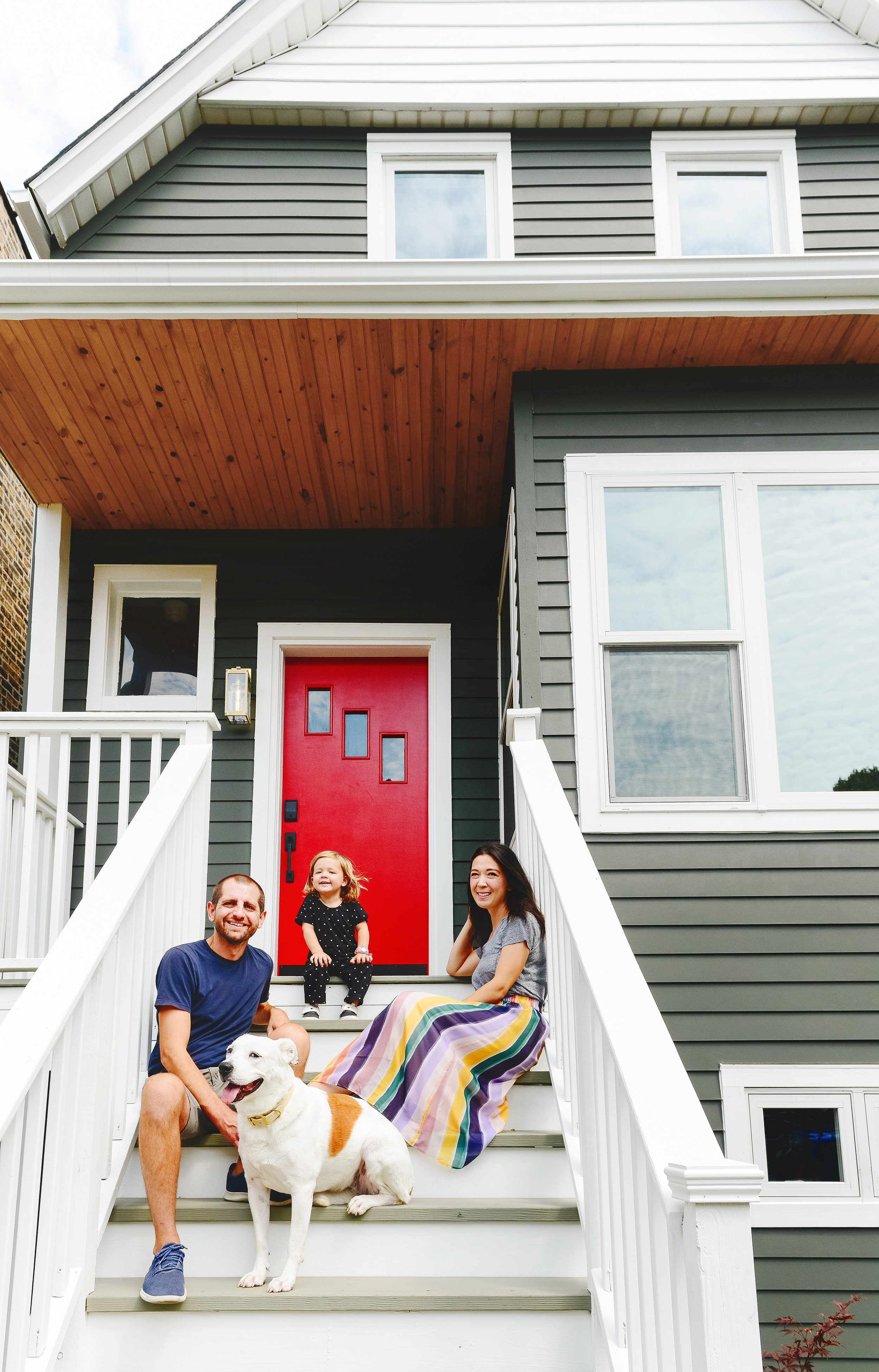 Family photo in front of the Two Flat with sweet Kitty! via Yellow Brick Home