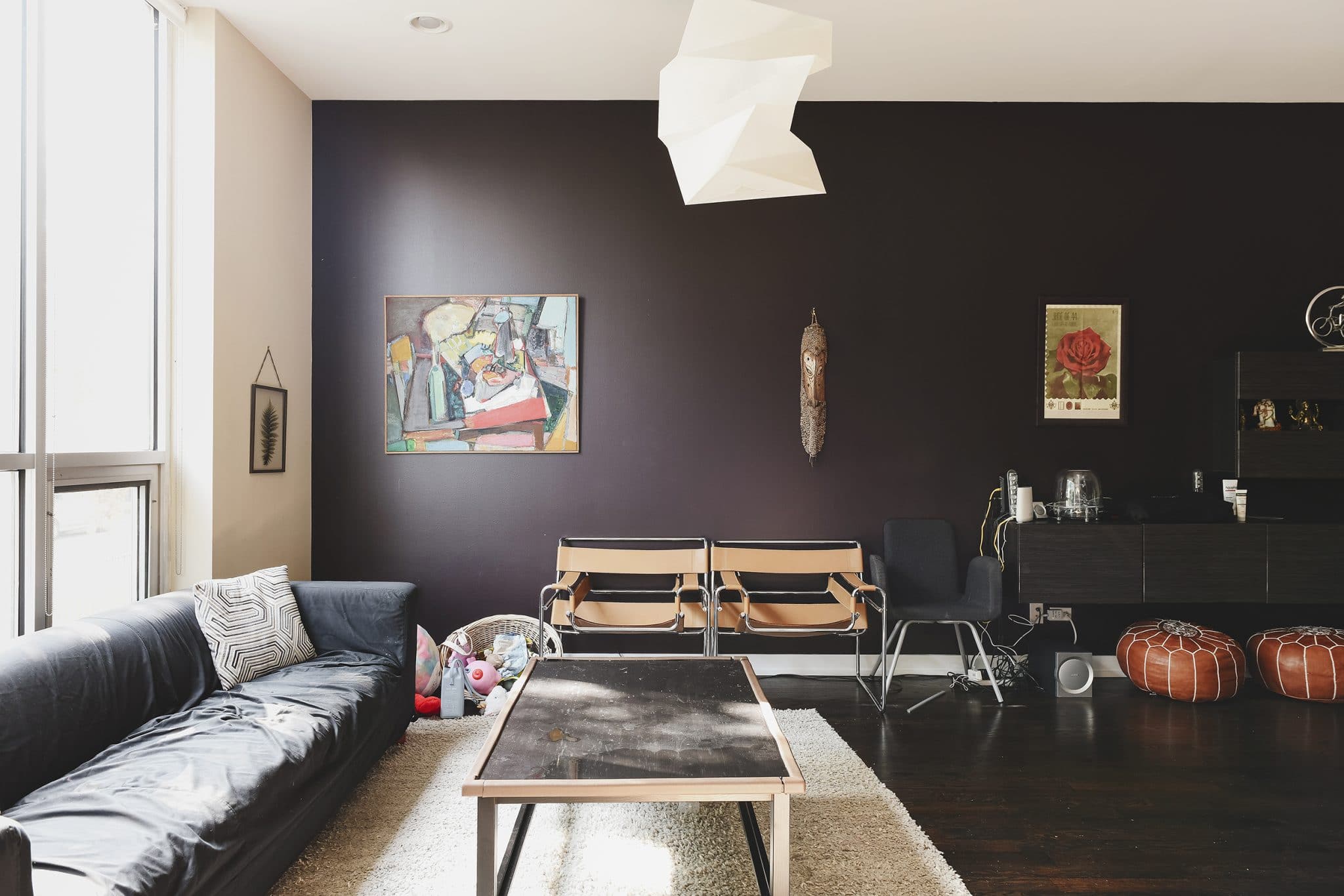 Dark + moody living room before getting a big bright + cheery facelift! | via Yellow Brick Home