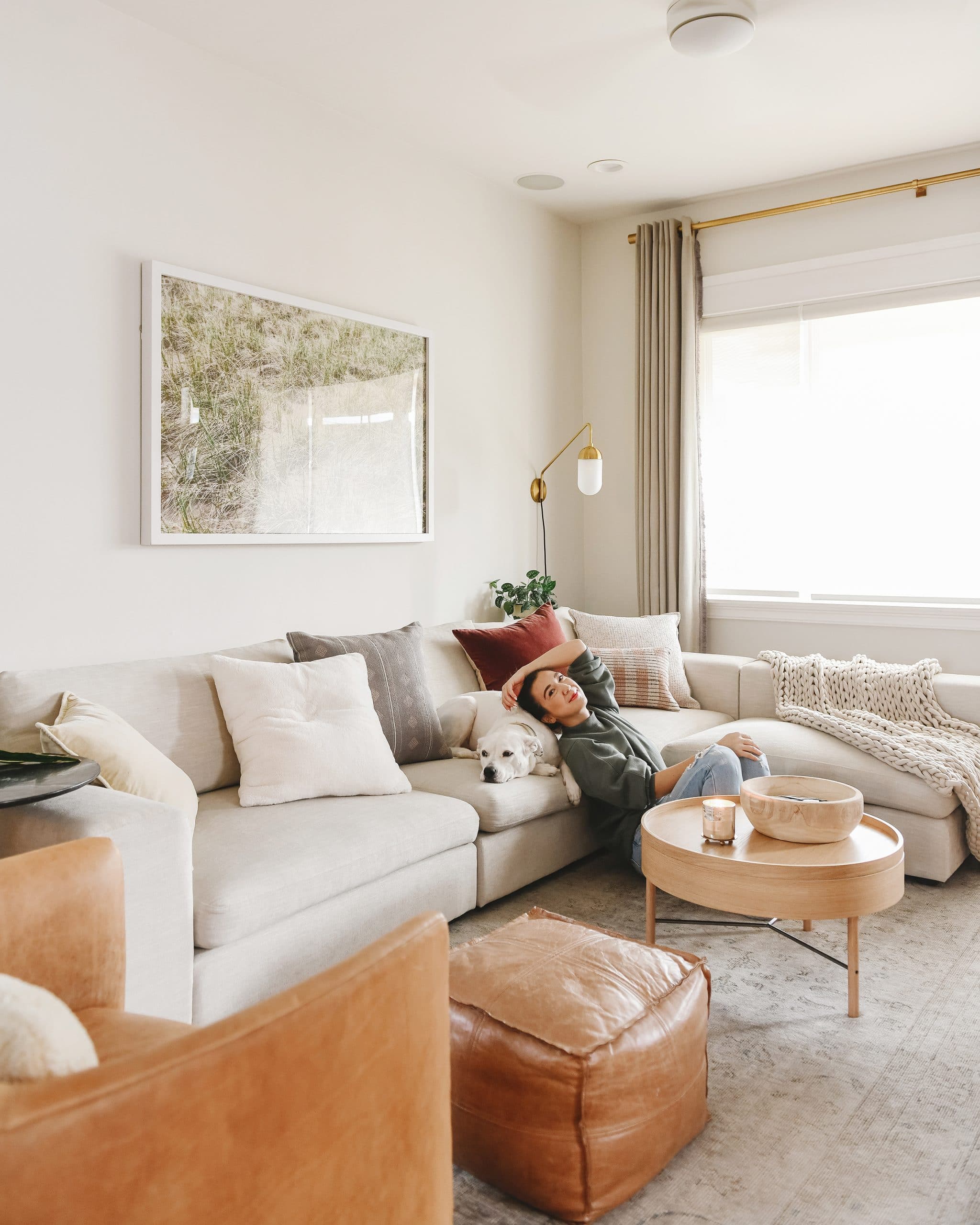 Kim and Kitty relaxing with the sofa | I'm sharing my simple, inviting formula for styling pillows on an L-shaped or U-shaped sofa, via Yellow Brick Home