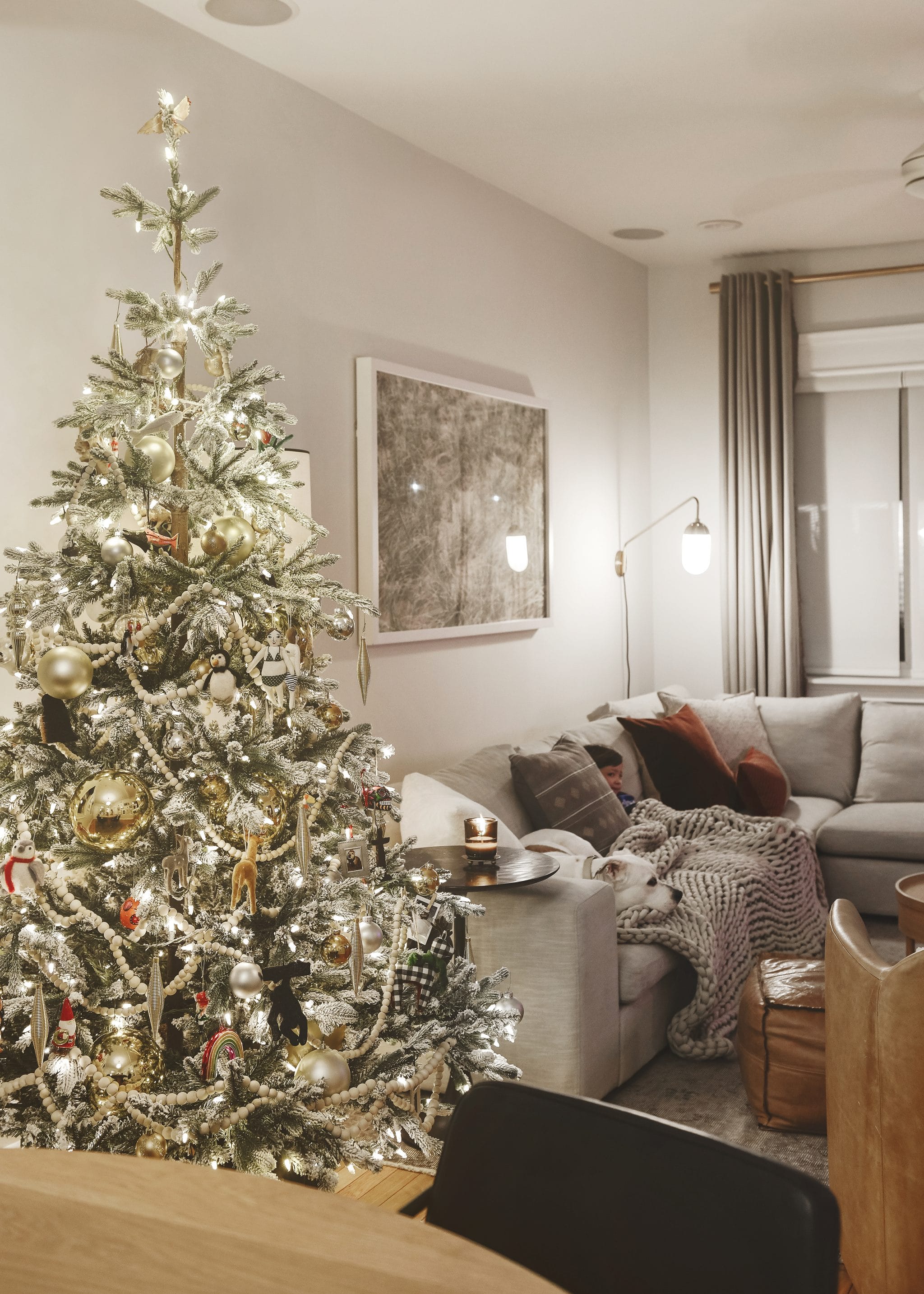Our Christmas tree in a cozy living room, via Yellow Brick Home