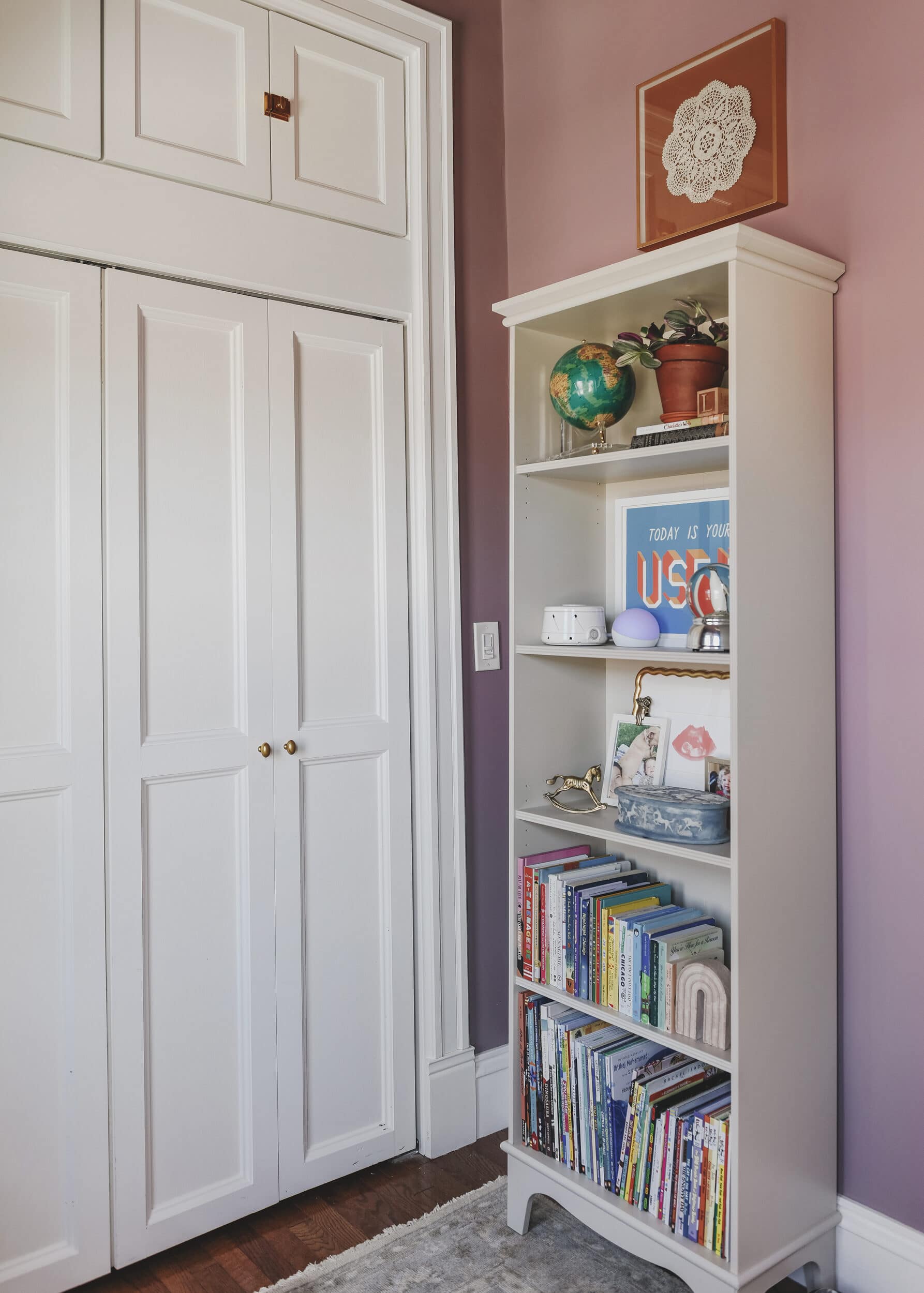 IKEA bookcase nook corner | purple and unicorn bedroom for a big kid via Yellow Brick Home