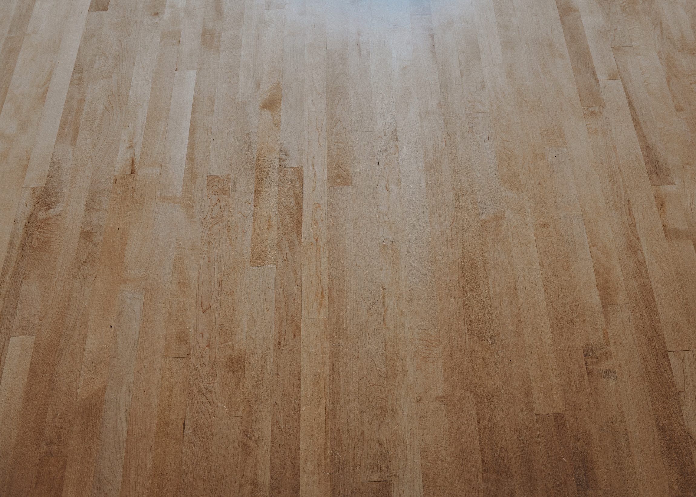 Maple flooring installed in our kitchen renomvation. 50/50 Minwax Ipswich Pine and DuraSeal Fruitwood stain | via Yellow Brick Home