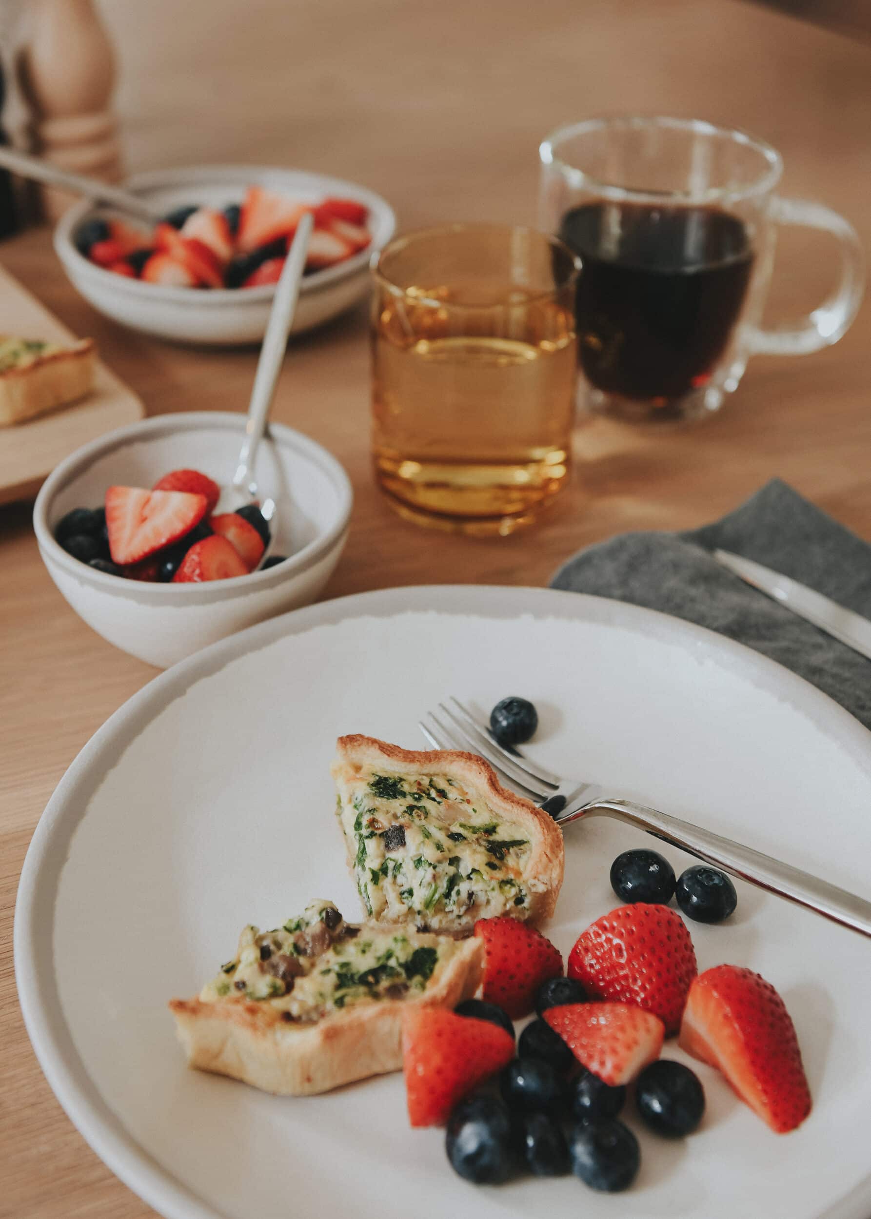 What's for brunch? Quiche and berries on a melamine plate featuring items from AllModern | via Yellow Brick Home
