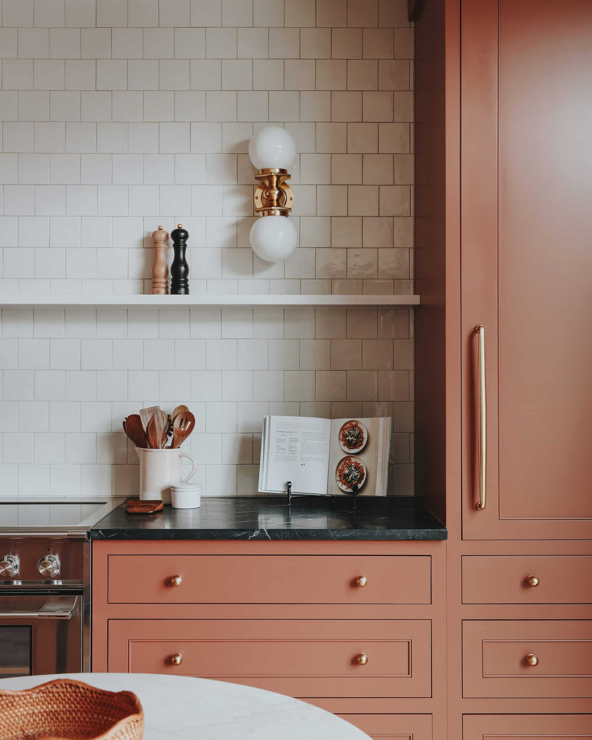 Pix Bianco tile and Irish Creme grout compliment the cabinets nicely // via Yellow Brick Home