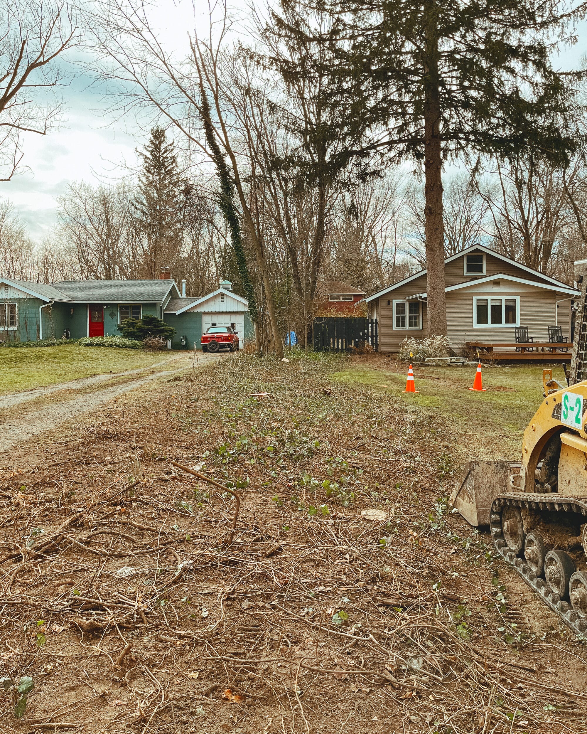 Landscaping work has begun! Clearing work for the berm | via Yellow Brick Home