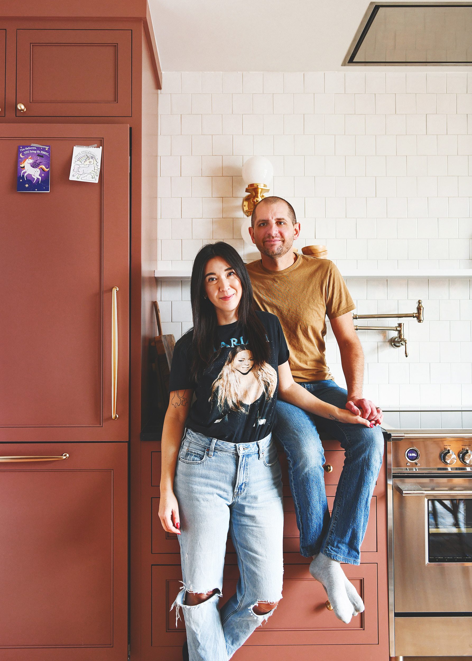 Kim and Scott in their renovated Chicago kitchen | via Yellow Brick Home
