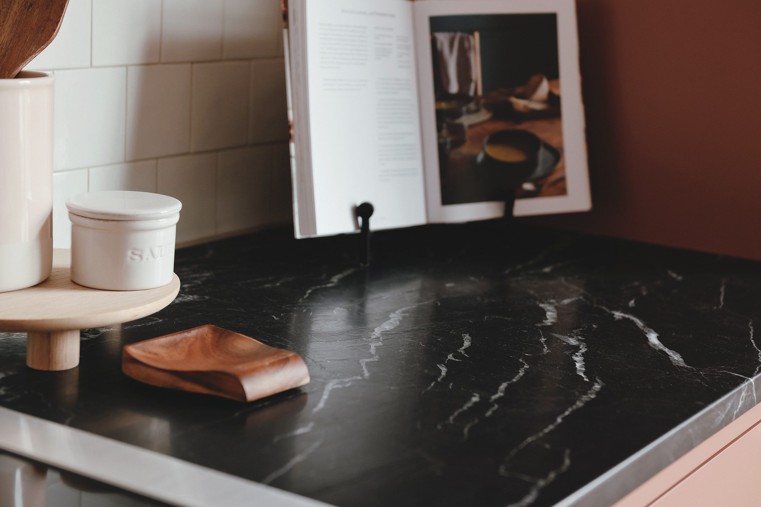 Black marble detail of our countertops | via Yellow Brick Home