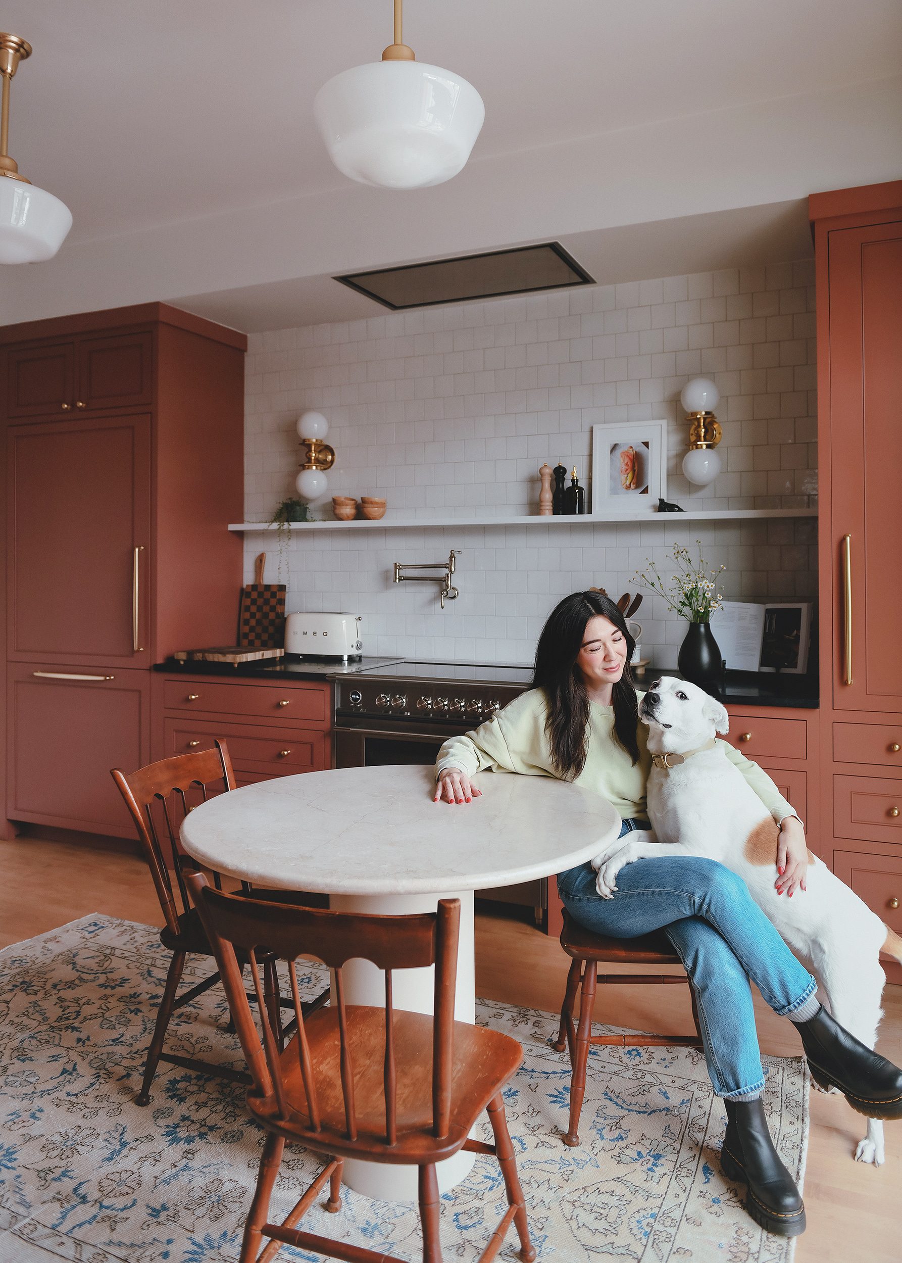 Kim and Kitty in newly renovated Chicago kitchen | via Yellow Brick Home