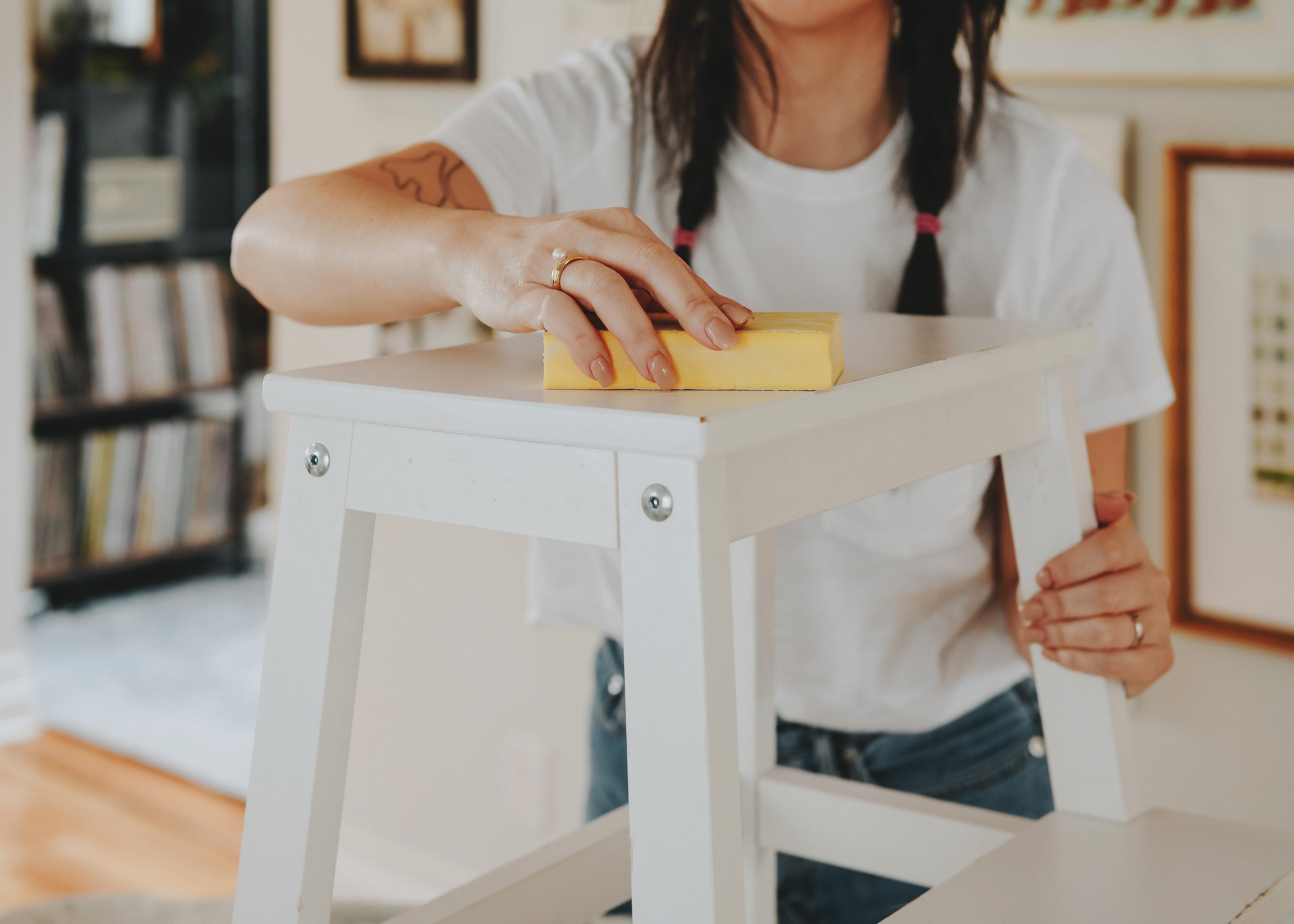 Sanding furniture in preparation for paint, how to paint furniture | via Yellow Brick Home