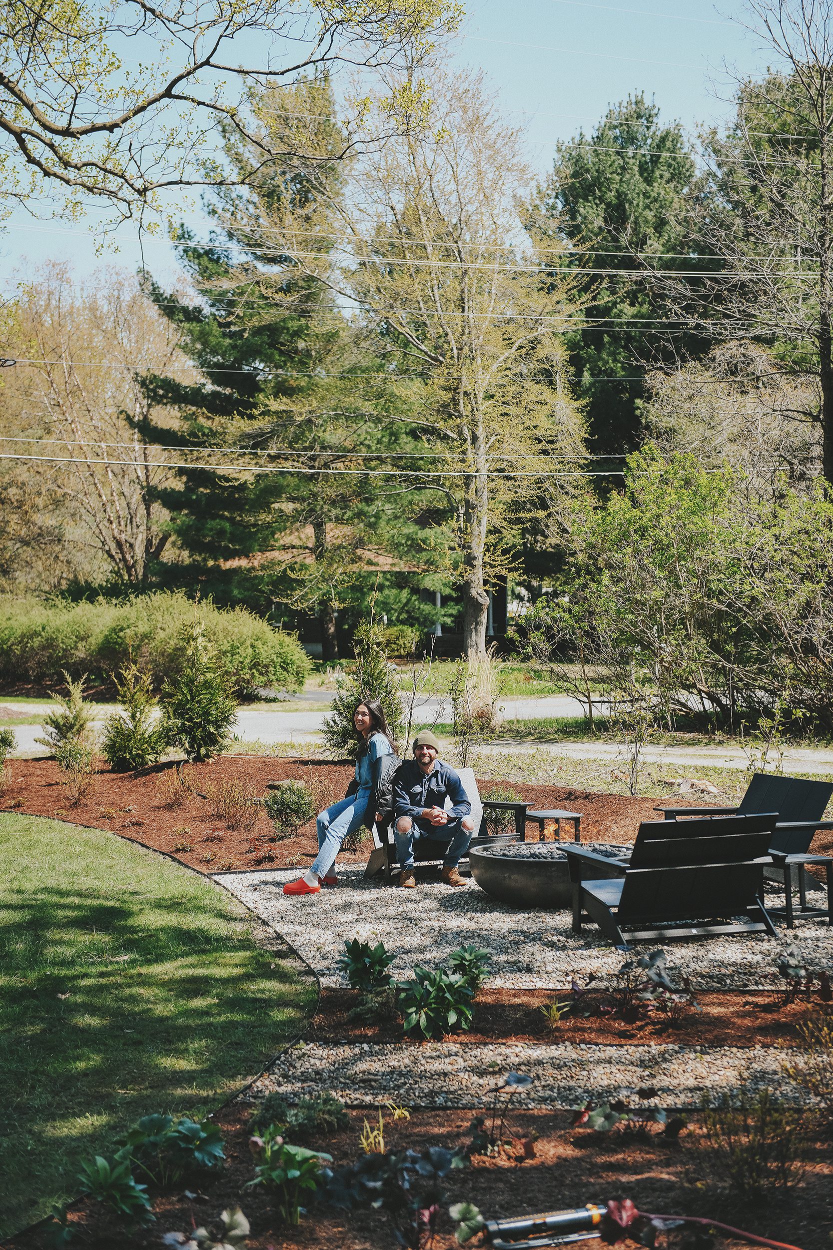 Scott + Kim relax on the new outdoor furniture after completing the landscaping project  // via Yellow Brick Home