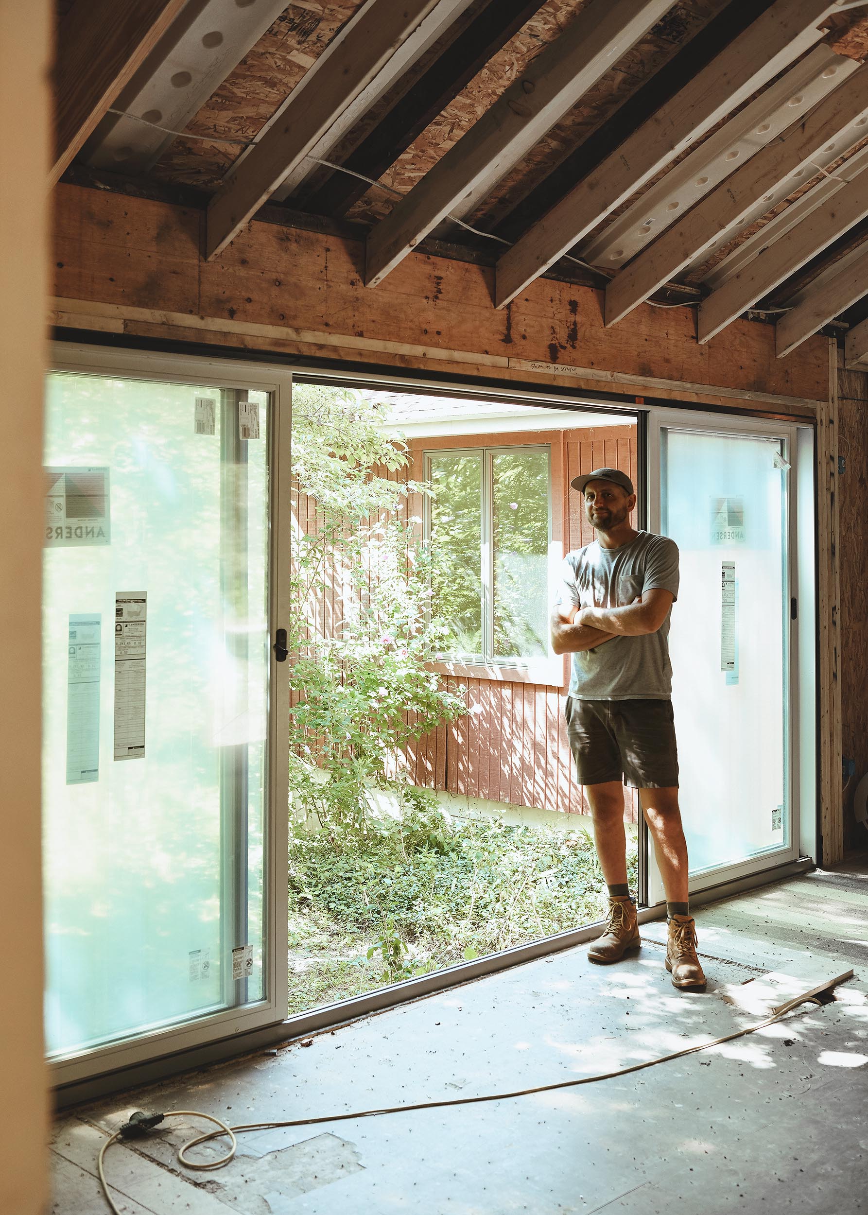 Scott for scale! This door is huge and lets in so much natural light // via Yellow Brick Home