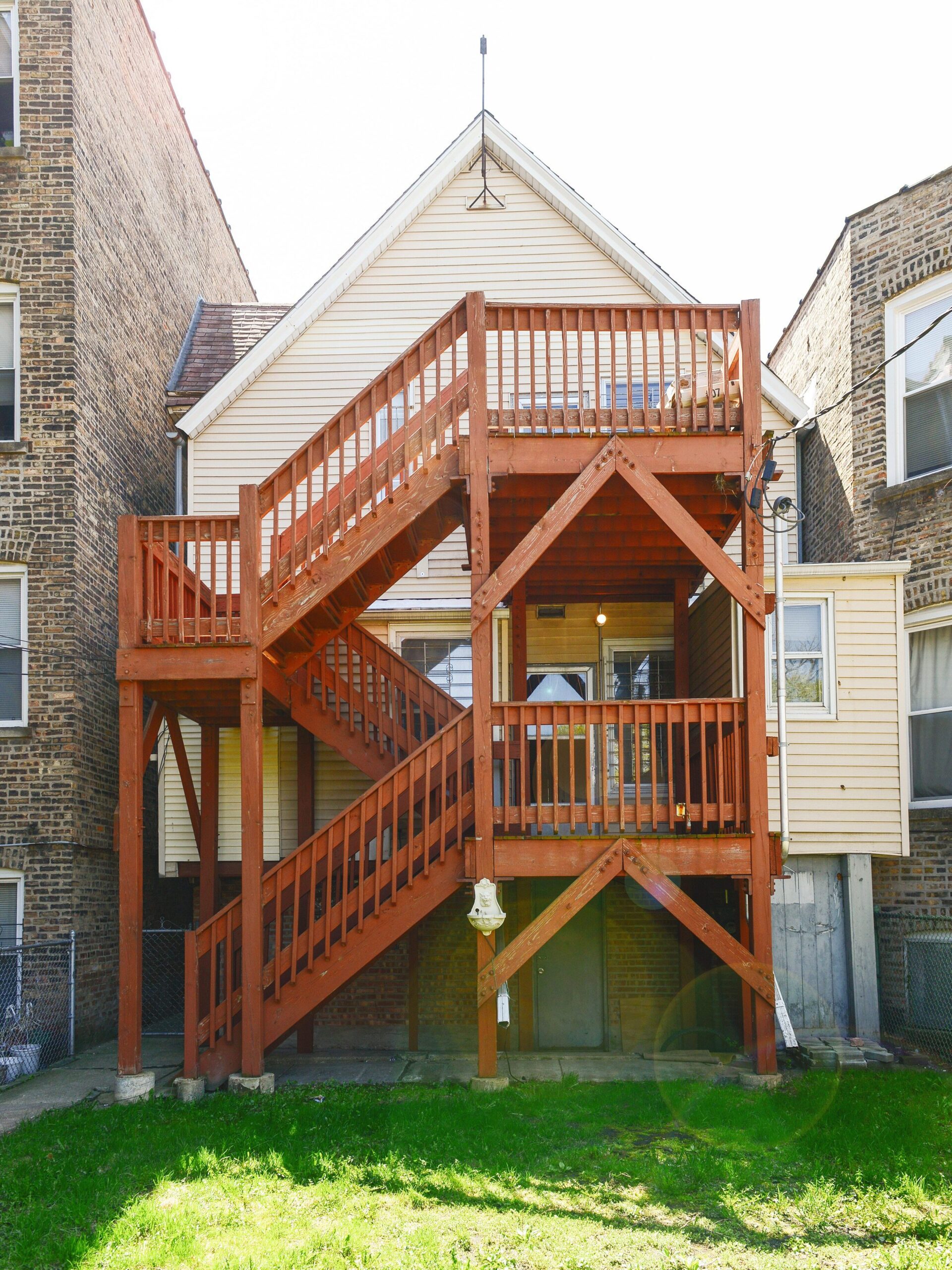 backyard of a Chicago Two Flat before renovation | via Yellow Brick Home